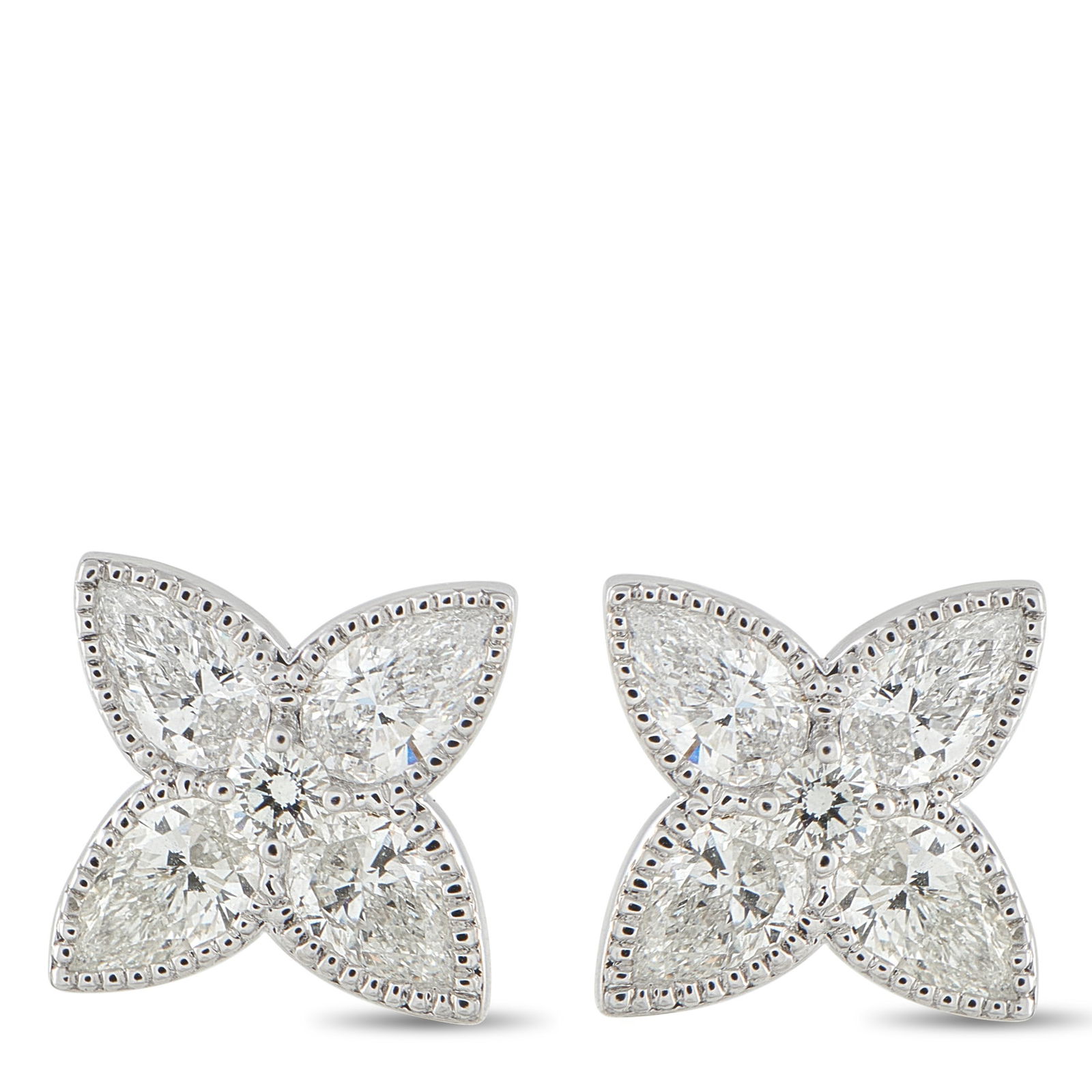 2.80ctw Diamond and 18K White Gold Quatrefoil Earrings: 2.80ctw Diamond and 18K White Gold Quatrefoil Stud Earrings - Small in scale yet confident in presence, these refined stud earrings showcase a timeless quatrefoil silhouette. Crafted in polished 18K w