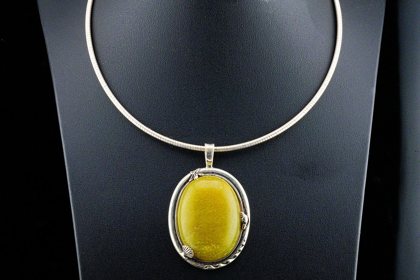 40mm Spinach Jade and Sterling Silver Pendant Necklace: 40mm Spinach Jade and Sterling Silver 16" Pendant Necklace - This necklace features a large oval spinach jade cabochon measuring approximately 40mm x 29mm, bezel-set in a hand-finished sterling silver