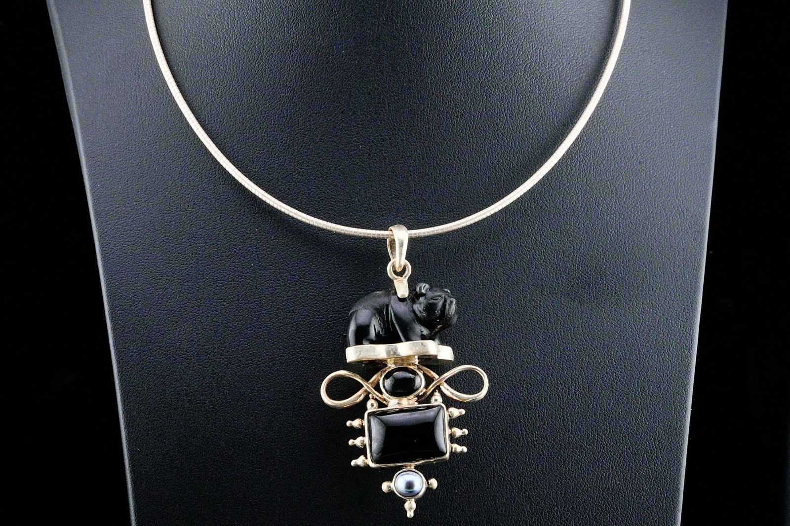 Sterling Silver, Onyx, Star Obsidian and Pearl Necklace: Vintage Sterling Silver, Onyx, Star Obsidian and Silver Pearl Figural Pendant Necklace - This unique necklace features a sculptural sterling silver pendant composed of multiple dark gemstone elements,