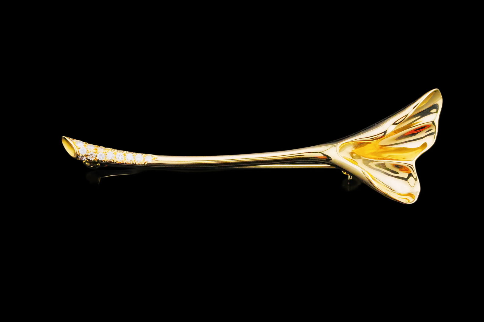 Tiffany & Co. 0.15ctw Diamond 18K Calla Lily Brooch: Tiffany & Co. 0.15ctw Diamond and 18K Yellow Gold 2.5" Calla Lily Brooch - Finely crafted in rich 18K yellow gold, this elegant brooch is designed as a graceful calla lily in bloom. The sculptural pet