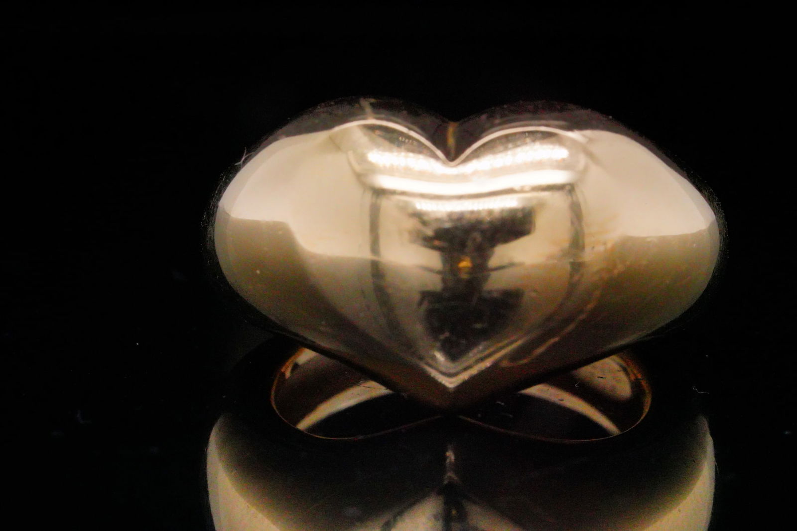 Chaumet Solid 18K Yellow Gold Heart Ring: Chaumet Solid 18K Yellow Gold Heart Ring - A beautifully crafted piece from the esteemed French jeweler, this solid 18K yellow gold ring features a bold, sculpted heart motif with smooth, polished con