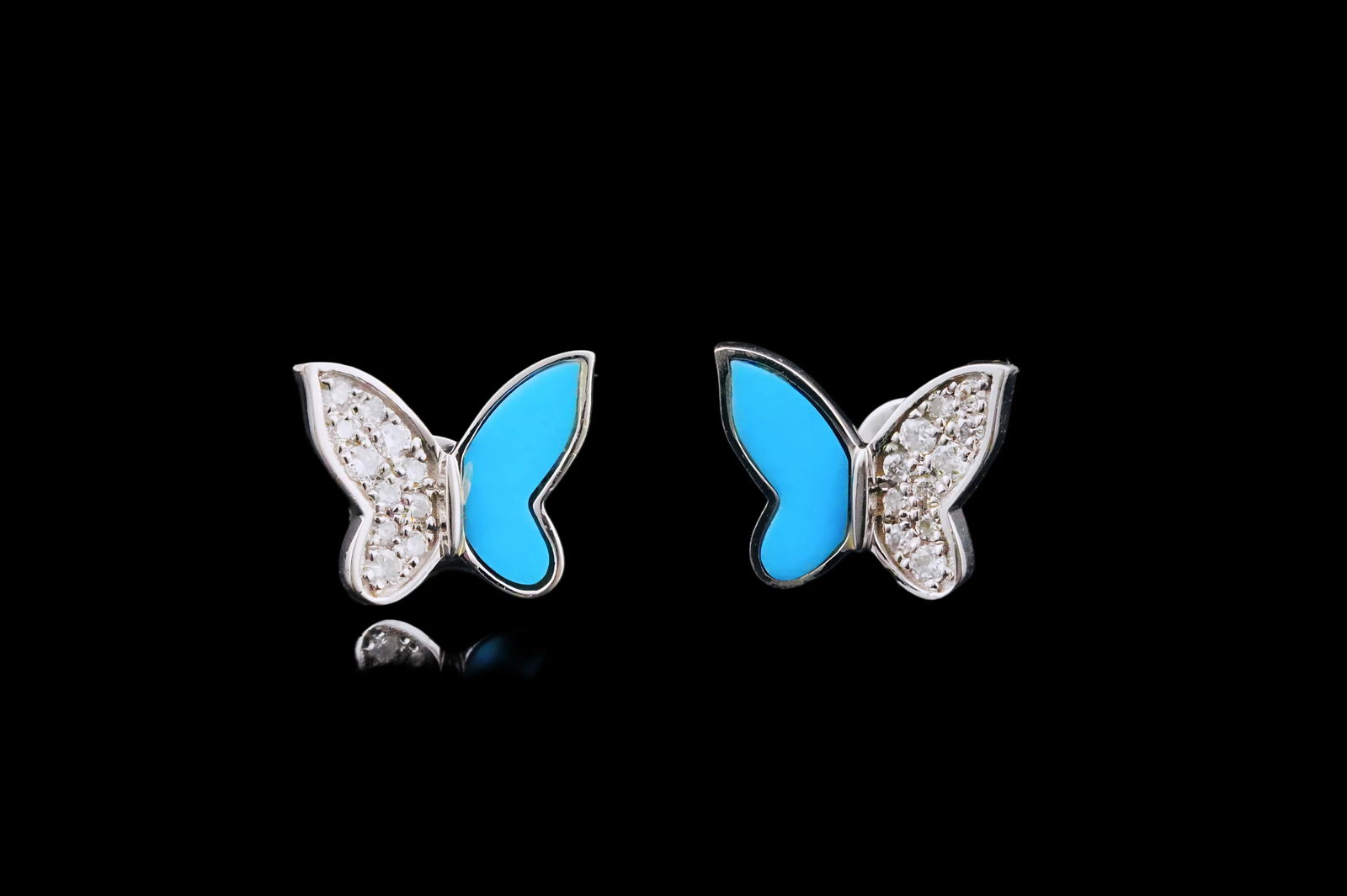 14K White Gold, Diamond and Enamel Butterfly Earrings: 14K White Gold, 0.10ctw Diamond and Blue Enamel 0.35" Butterfly Stud Earrings - These earrings are crafted in 14k white gold and are embellished with approximately 0.10ctw diamonds along with beautifu