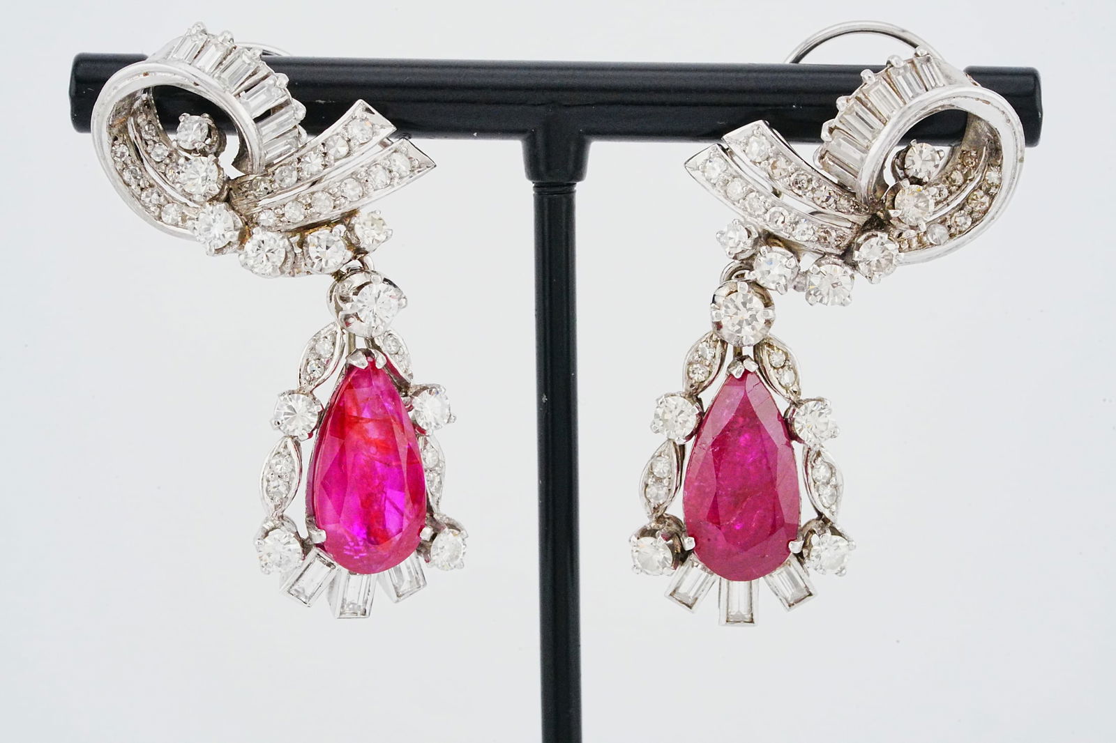 10.00ctw Ruby, 4.00ctw Diamond and Platinum Earrings: 10.00ctw Ruby, 4.00ctw VS1-SI1/G-H Diamond and Platinum Vintage 1.75" Drop Earrings - THIS ITEM WILL COME WITH A $30,000 INSURANCE VALUATION REPORT IN THE WINNING BIDDER'S NAME. Exquisite vintage drop