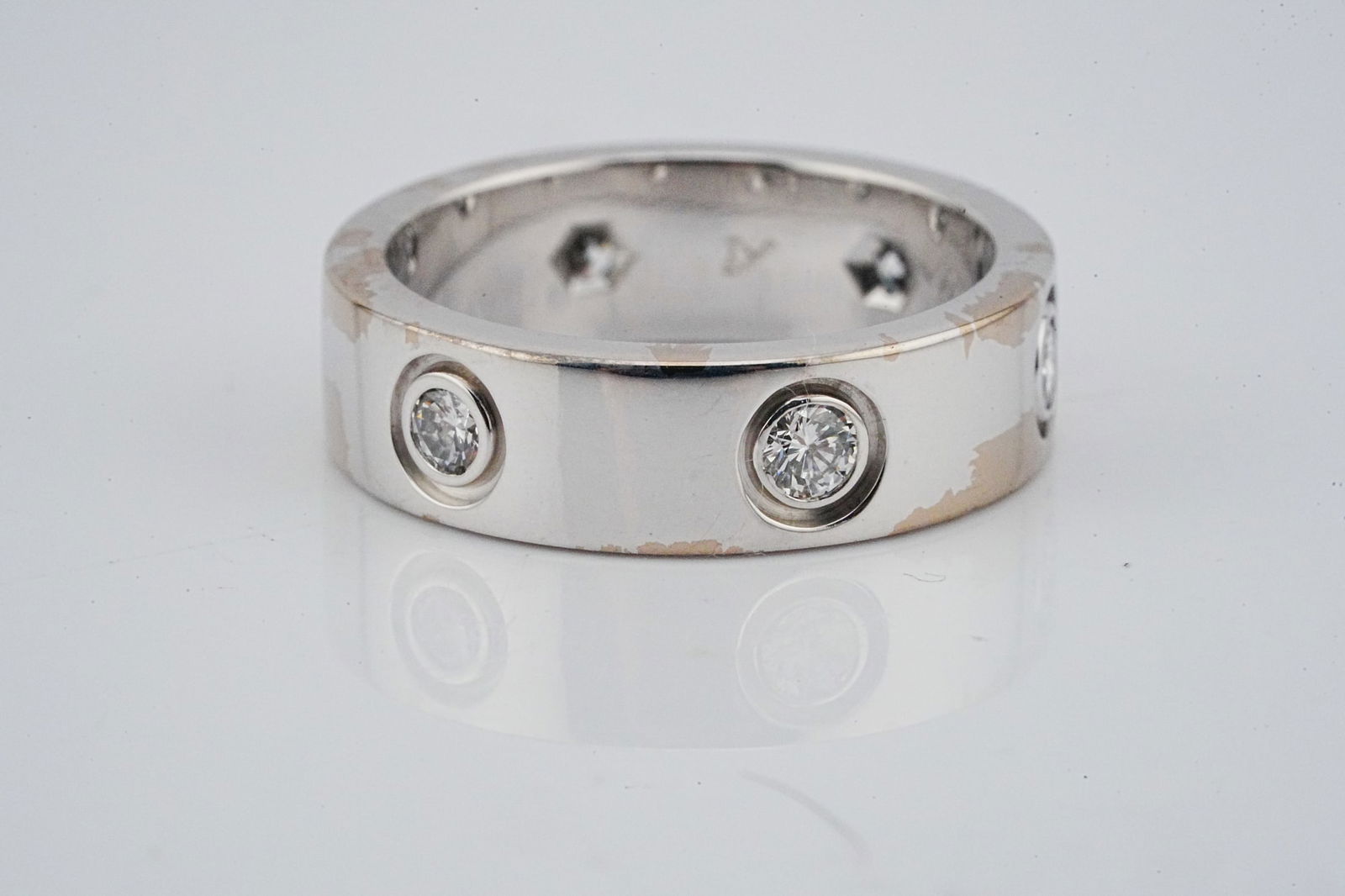 Cartier LOVE 18K White Gold 6-Diamond Ring: Cartier LOVE 18K White Gold 6-Diamond Ring - Iconic and enduring, this Cartier LOVE ring is exquisitely crafted in luminous 18K white gold and set with six brilliant-cut diamonds, each precisely place