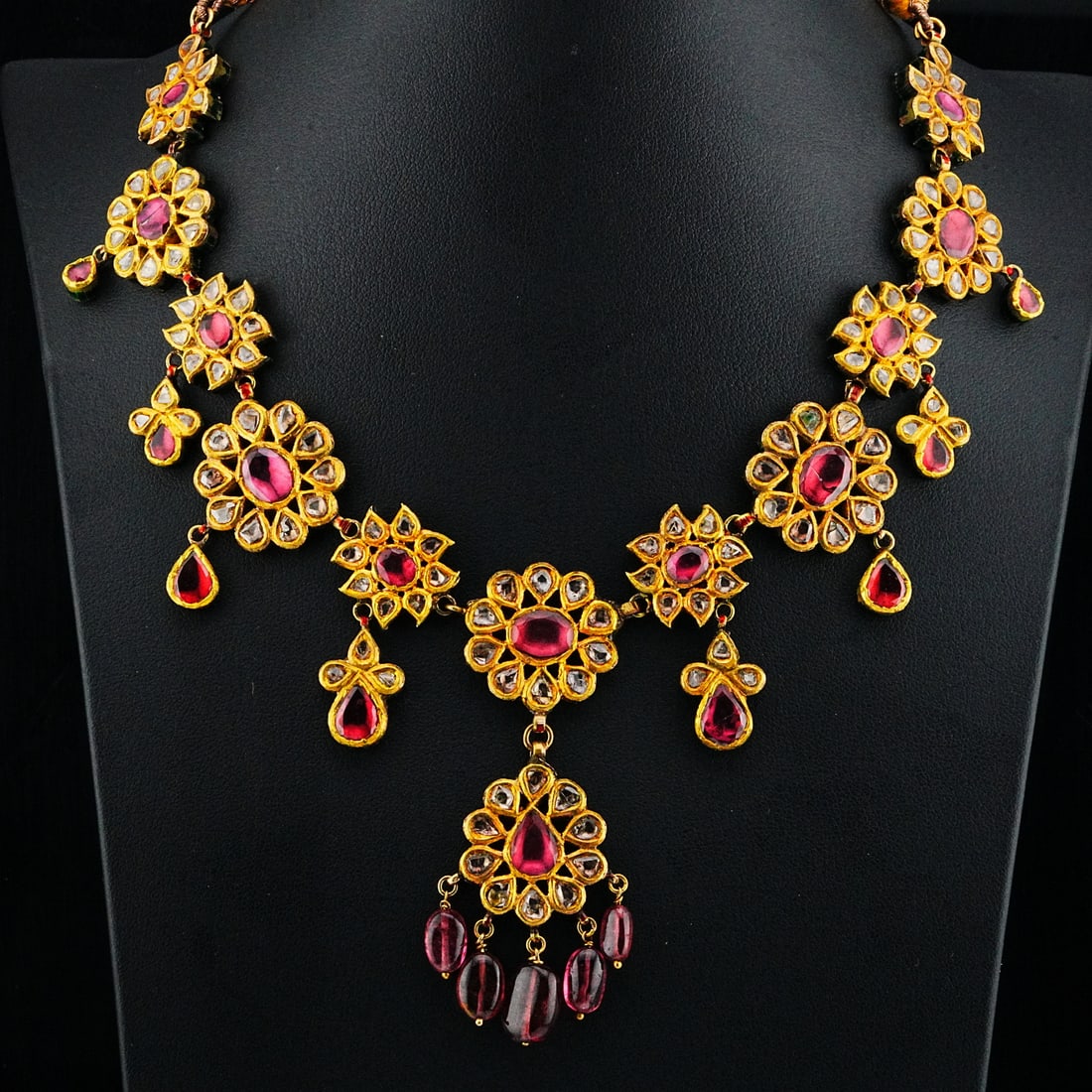 22K, Uncut Diamond and Tourmaline Festoon Necklace: 22K Yellow Gold, Uncut Diamond and Pink Tourmaline Festoon Necklace with Enameled Reverse - THIS ITEM WILL COME WITH A $32,000 INSURANCE VALUATION REPORT IN THE WINNING BIDDER'S NAME. An opulent and i