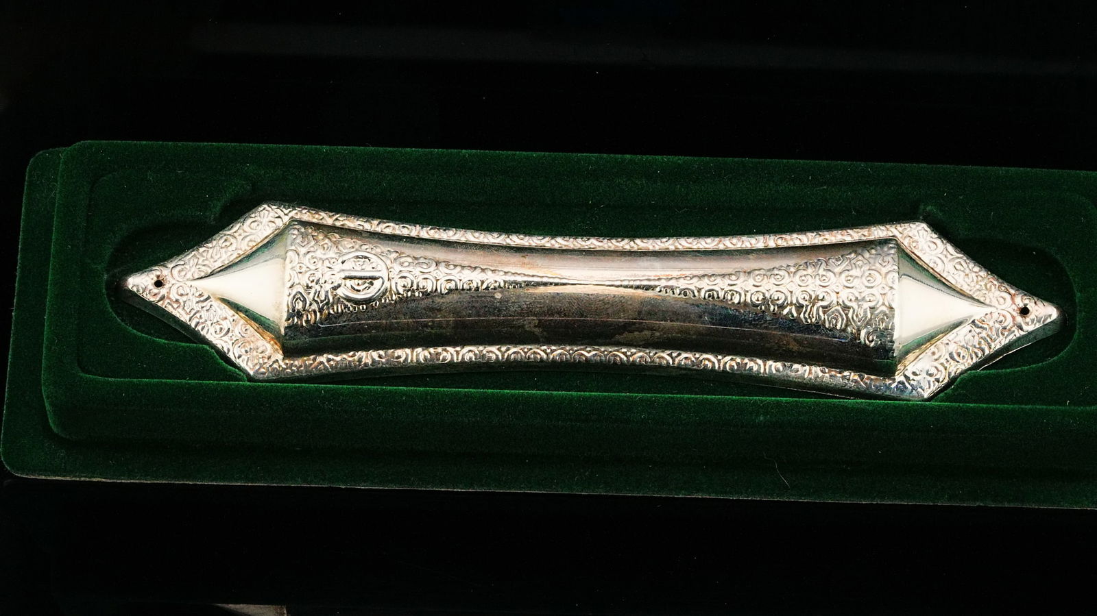 Vintage Sterling Silver Mezuzah Case in Original Box: Vintage Sterling Silver Mezuzah Case in Original Box - A refined vintage sterling silver mezuzah case, elegantly crafted in a classic elongated architectural form with finely detailed repousse scrollw