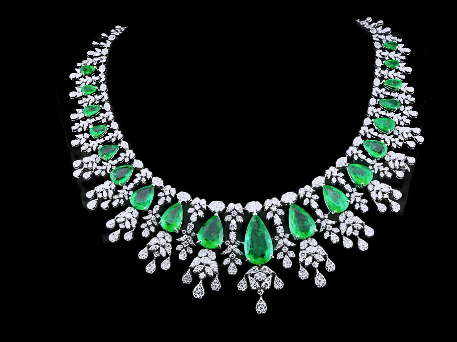 52.60ctw Emerald, 20.00ctw Diamond and 18K Necklace: 52.60ctw Emerald, 20.00ctw VS1-SI1/G-H Diamond and 18K White Gold 16" Cocktail Necklace - THIS ITEM WILL COME WITH A $242,000 INSURANCE VALUATION REPORT IN THE WINNING BIDDER'S NAME. This extraordinar