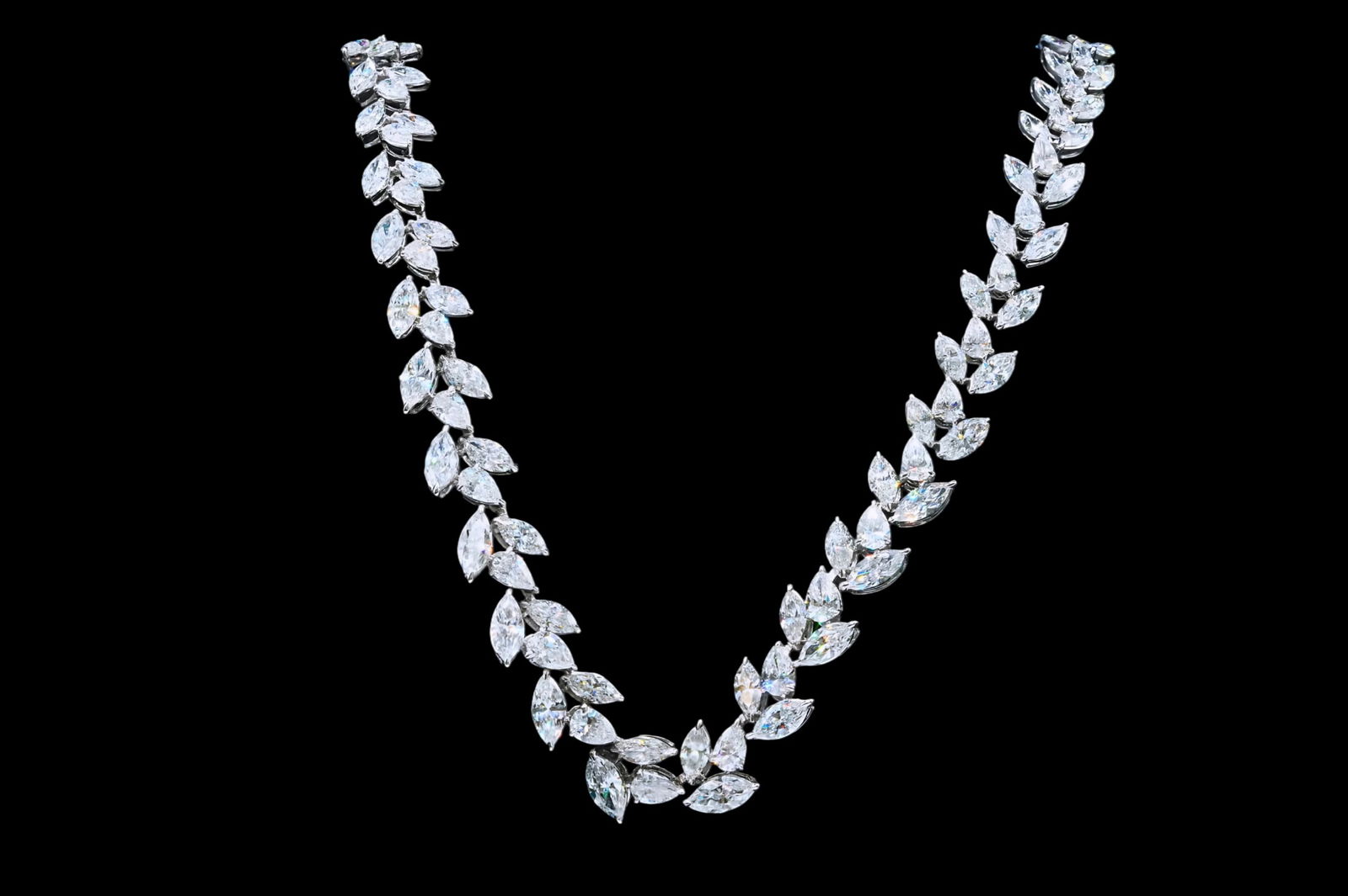 45.35ctw Pear and Marquise Cut Diamond 18K Necklace: 45.35ctw VS1-SI1/F-H Pear and Marquise Cut Diamond 18K White Gold 16.75" Necklace - This item will come with a $428,000 insurance valuation report in the winning bidder's name by a graduate appraiser.