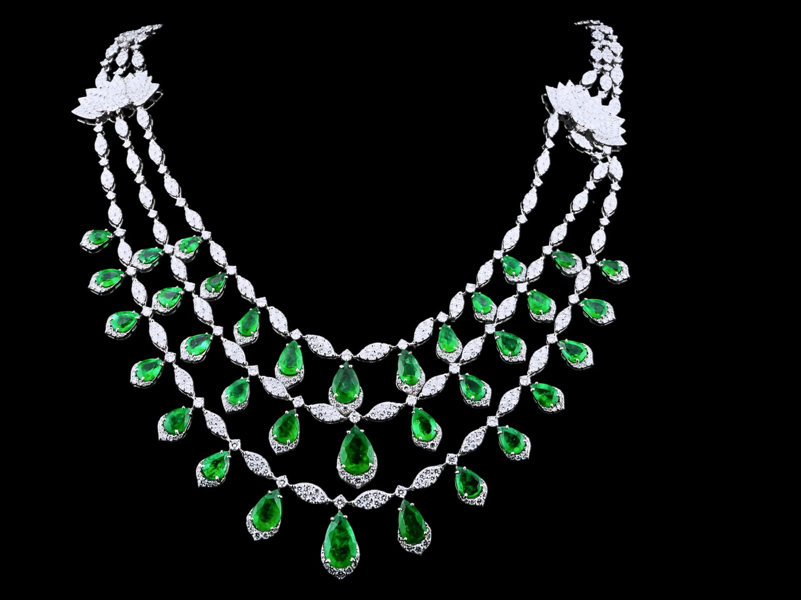 26.00ctw Emerald, 14.50ctw Diamond and 18K Necklace: 26.00ctw Emerald, 14.50ctw VS1-SI1/G-H Diamond and 18K White Gold 16" 3-Strand Cocktail Necklace - THIS ITEM WILL COME WITH A $165,000 INSURANCE VALUATION REPORT IN THE WINNING BIDDER'S NAME. This exc