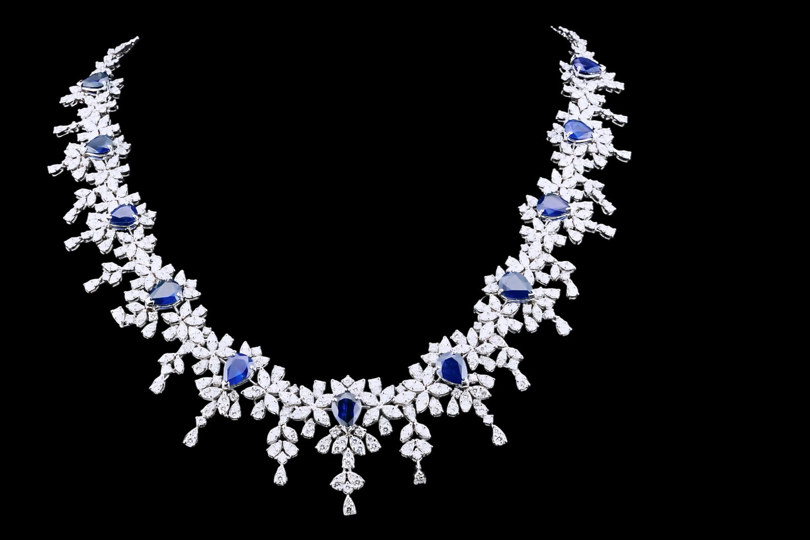 16.30ctw Sapphire, 14.75ctw Diamond and 18K Necklace: 16.30ctw Blue Sapphire, 14.75ctw VS1-SI1/G-H Diamond and 18K White Gold 16" Cocktail Necklace - THIS ITEM WILL COME WITH A $144,000 INSURANCE VALUATION REPORT IN THE WINNING BIDDER'S NAME. This extrao