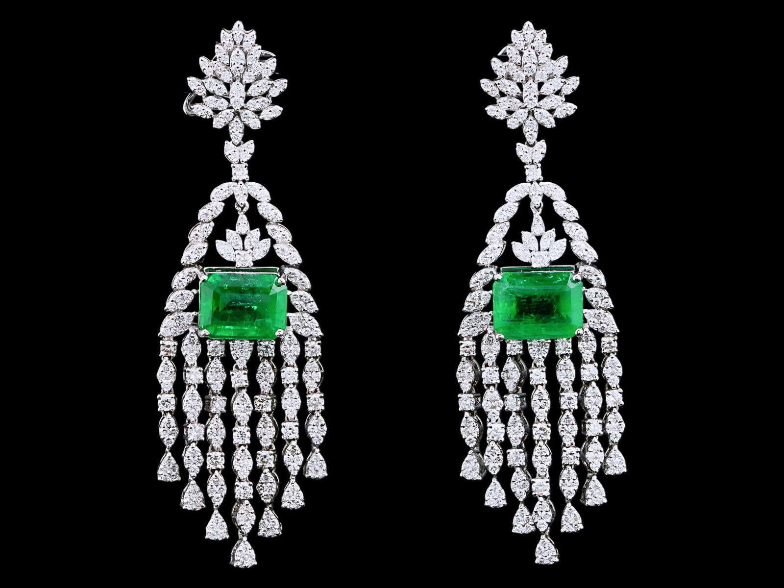 12.00ctw Emerald, 3.00ctw Diamond and 18K 3" Earrings: 12.00ctw Emerald, 3.00ctw VS1-SI1/G-H Diamond and 18K White Gold 3" Chandelier Earrings - THIS ITEM WILL COME WITH A $56,000 INSURANCE VALUATION REPORT IN THE WINNING BIDDER'S NAME. These dramatic cha