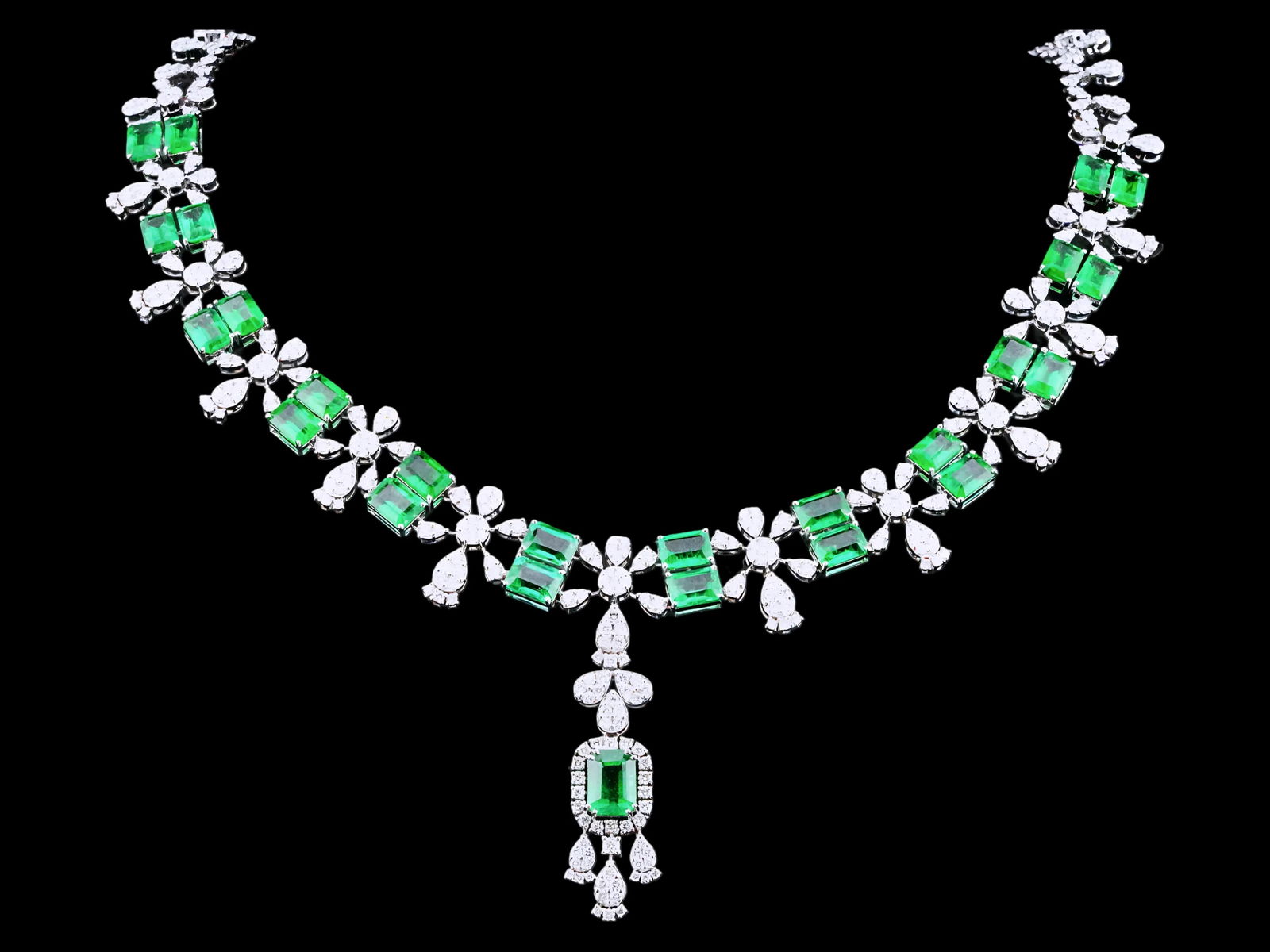 24.00ctw Emerald, 10.00ctw Diamond and 18K Necklace: 24.00ctw Emerald, 10.00ctw VS1-SI1/G-H Diamond and 18K White Gold 16" Necklace - THIS ITEM WILL COME WITH A $136,000 INSURANCE VALUATION REPORT IN THE WINNING BIDDER'S NAME. This elegant statement