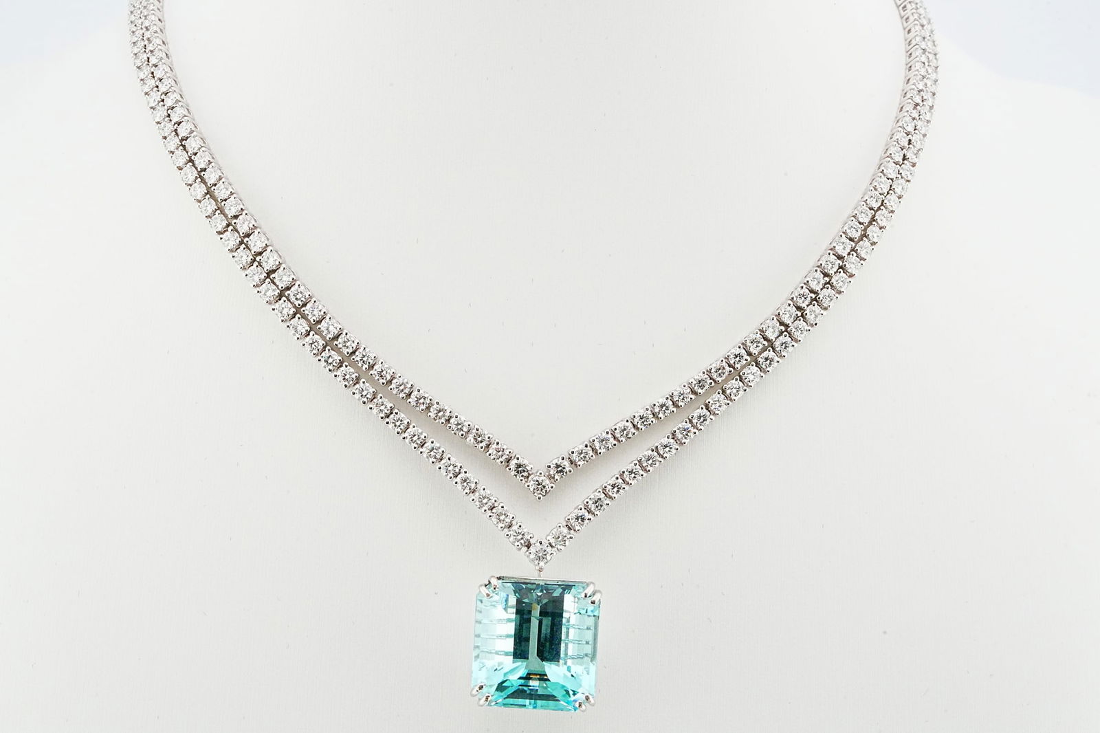 26.50ct Aquamarine, 14.00ctw Diamond and 18K Necklace: 26.50ct Aquamarine, 14.00ctw VS1-VS2/G-H Diamond and 18K White Gold 16" Dual-Strand Necklace - This item will come with a $103,000 insurance valuation report in the winning bidder's name. Centered by
