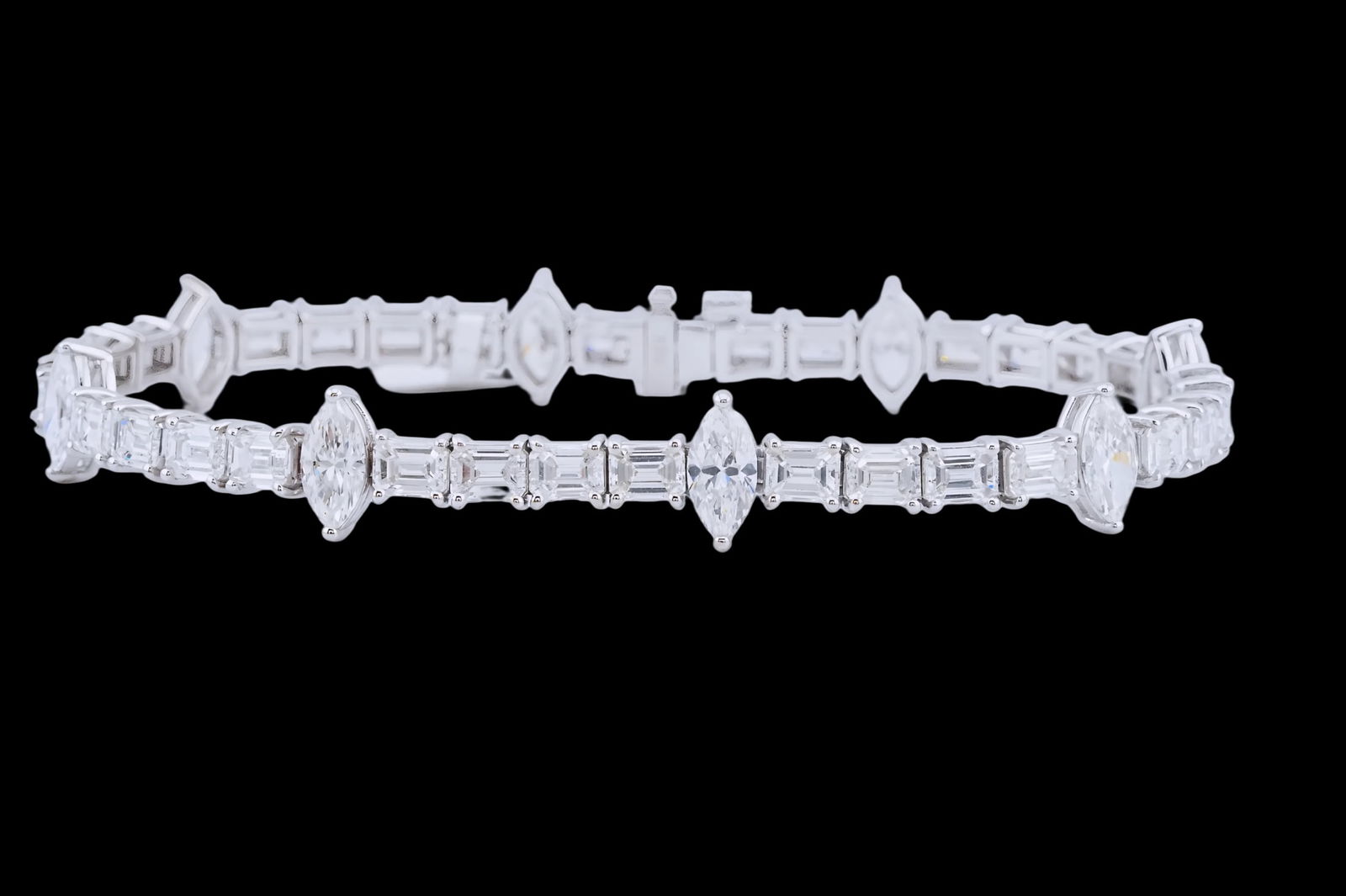 12.80ctw Diamond and 18K White Gold 7" Bracelet: 12.80ctw VS1-SI1/F-H Diamond and 18K White Gold 7" Bracelet - This item will come with a $108,000 insurance valuation report in the winning bidder's name by a graduate appraiser. An elegant diamond