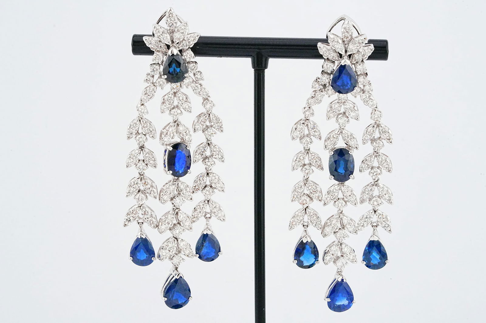 11.60ctw Blue Sapphire, 6.65ctw Diamond, 18K Earrings: 11.60ctw Blue Sapphire, 6.65ctw VS1-VS2/G-H Diamond and 18K White Gold 2.75" Chandelier Earrings - This item will come with a $53,000 insurance valuation report in the winning bidder's name.