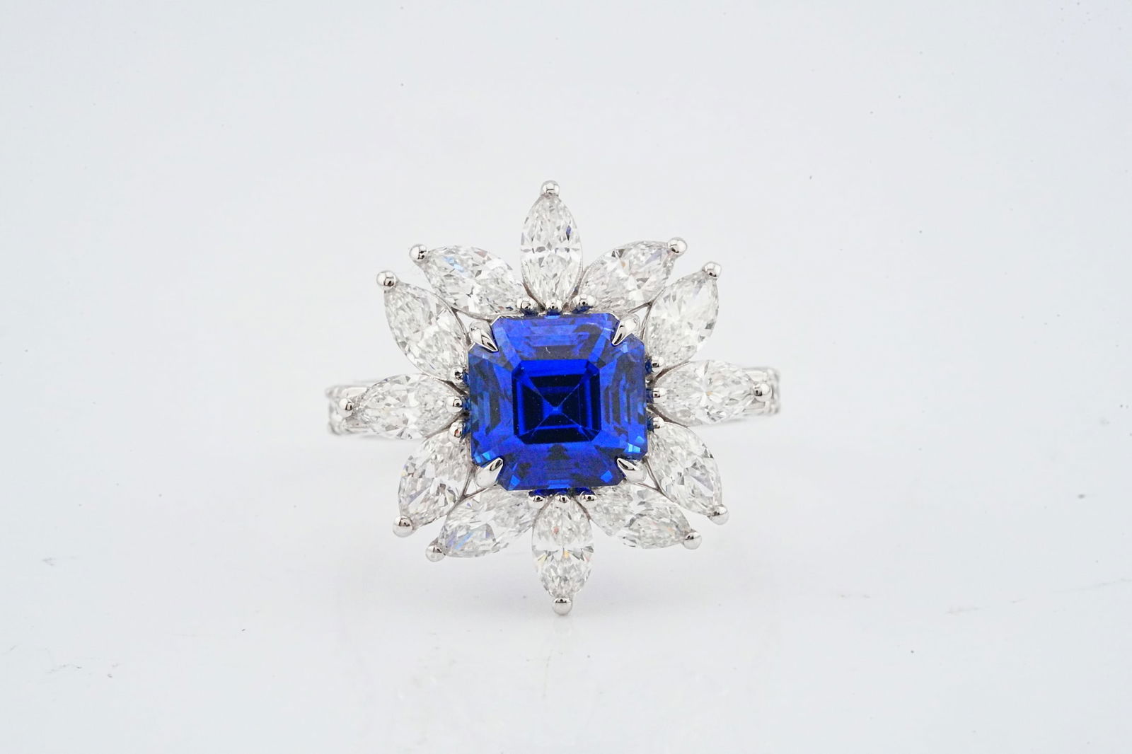 3.65ct Blue Sapphire, 2.10ctw Diamond and 18K Ring: 3.65ct Blue Sapphire, 2.10ctw VS1-VS2/G-H Diamond and 18K White Gold Ring - This item will come with a $52,000 insurance valuation report in the winning bidder's name. An exquisite and highly refined