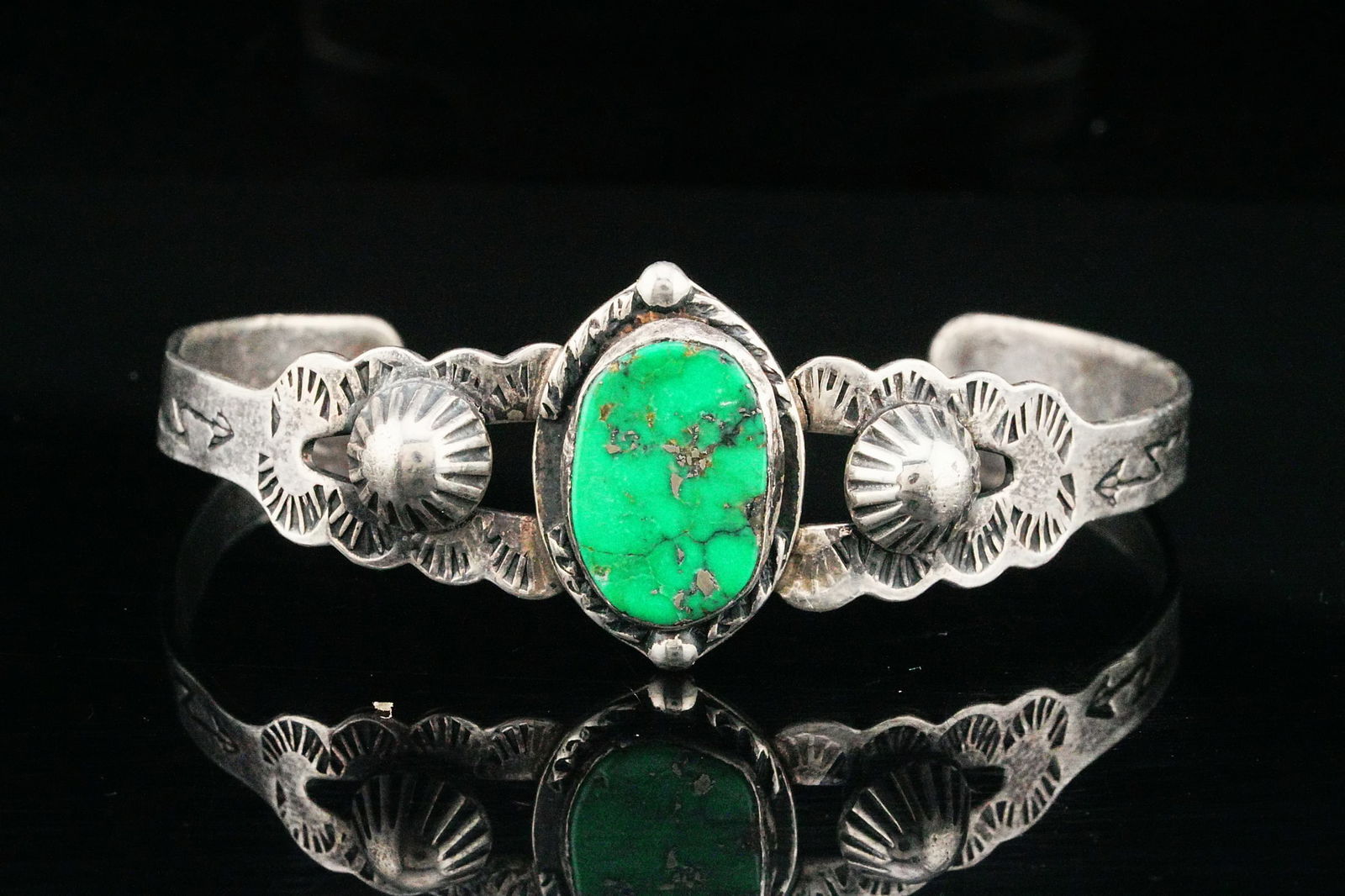 Native American Turquoise and Sterling Silver Cuff: Native American Vintage 15mm Turquoise and Sterling Silver Cuff Bracelet - A striking vintage Native American sterling silver cuff bracelet featuring a vibrant 15mm turquoise cabochon set in a