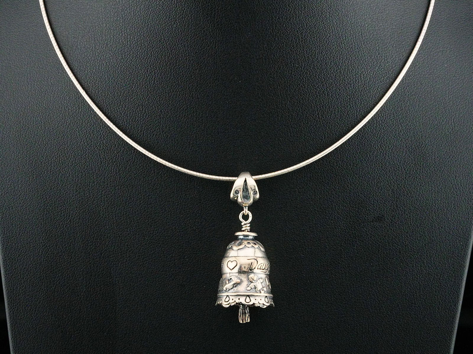 Solid Sterling Silver 16" Bell Pendant Necklace: Solid Sterling Silver 16" Bell Pendant Necklace - This necklace features a finely detailed sterling silver bell pendant engraved "Daughter" in script, accented with raised heart motifs and decorative