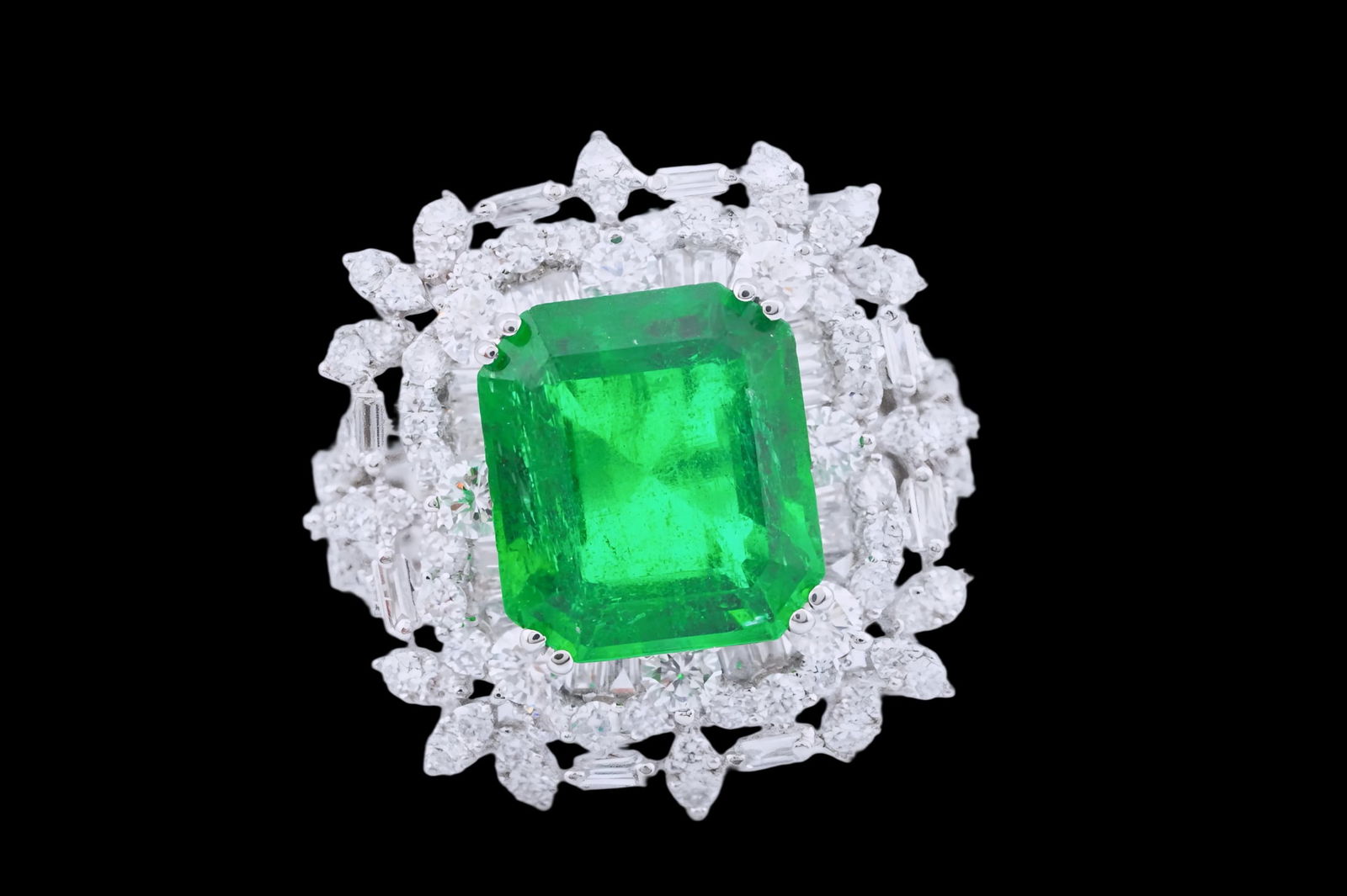 4.95ct Zambian Emerald, 2.25ctw Diamond and 18K Ring: 4.95ct Zambian Emerald, 2.25ctw VS1-SI1/G-H Diamond and 18K White Gold Ring - This item will come with a $47,500 insurance valuation report in the winning bidder's name by a graduate appraiser. A