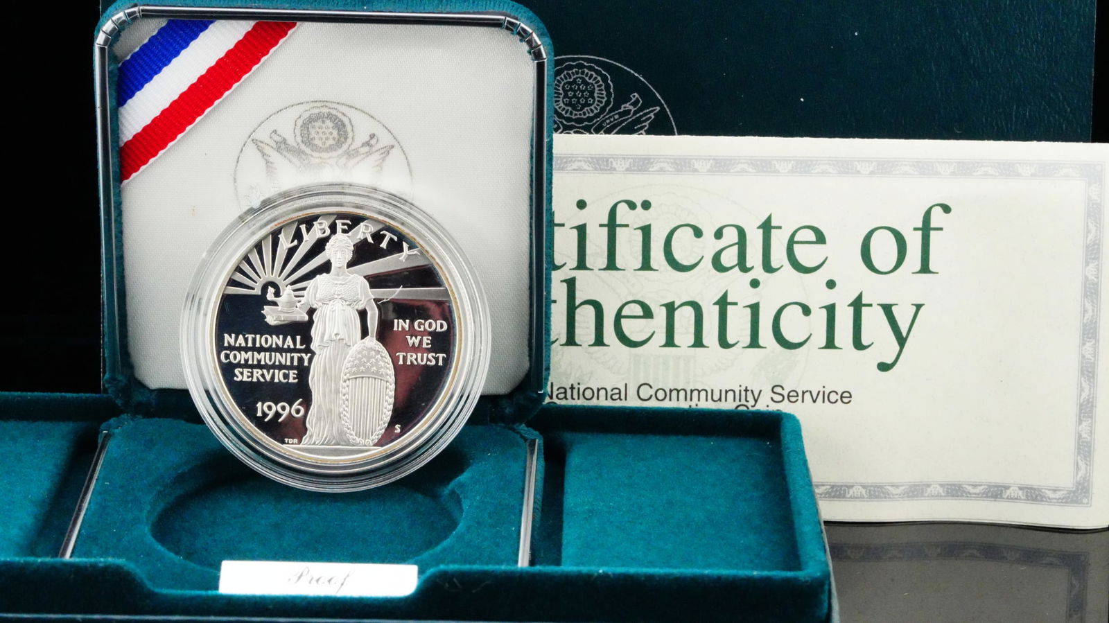 1996-S U.S. 90% Silver Community Service Dollar: 1996-S U.S. 90% Silver Community Service Commemorative Silver Dollar W/Original Box and COA - This 1996 United States Community Service Silver Dollar is struck in 90% silver and was issued for one