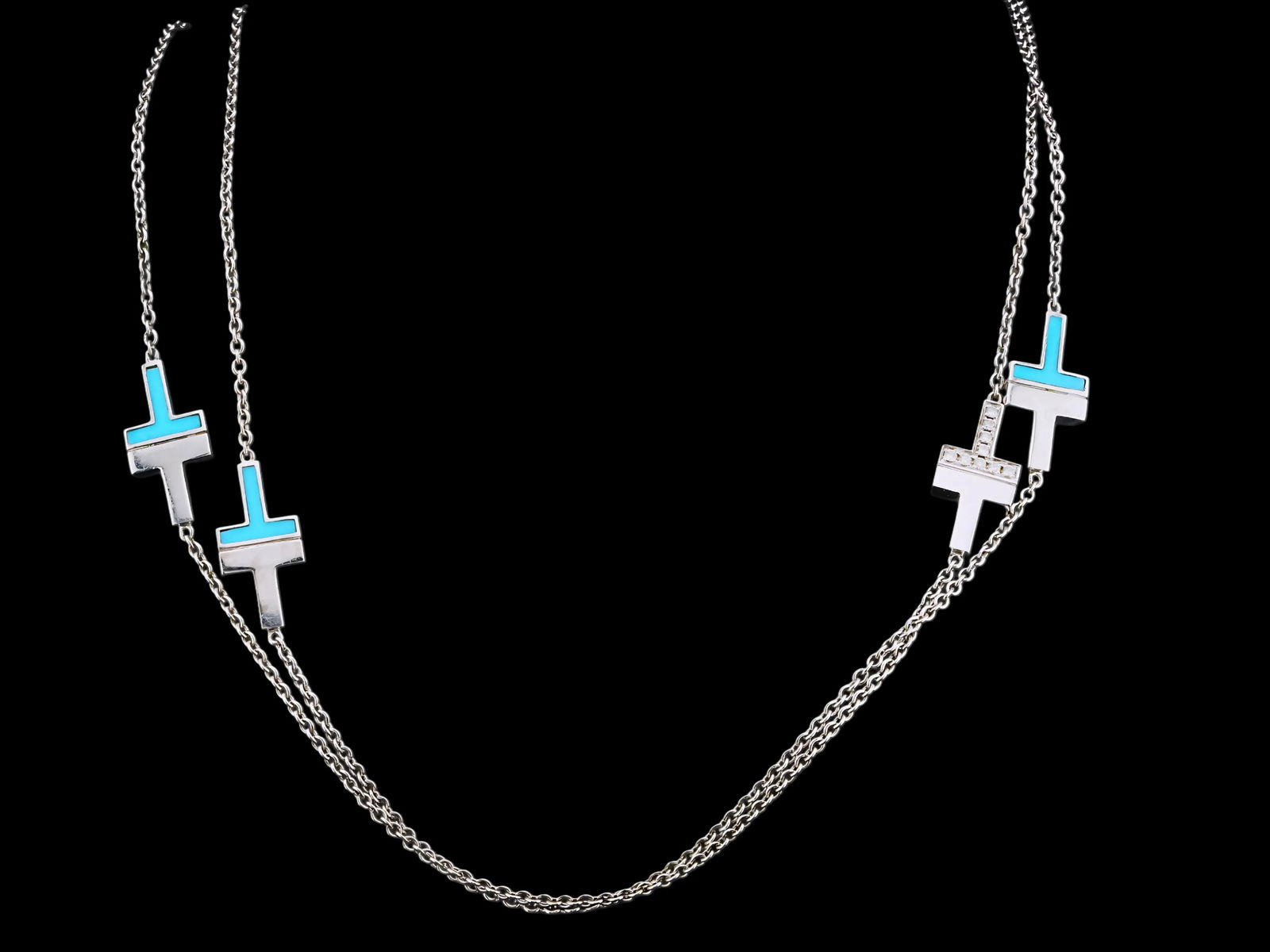 Tiffany & Co. 0.80ctw Diamond, Turquoise, 18K Necklace: Tiffany & Co. 0.80ctw VS1-VS2/F-G Diamond, Turquoise and 18K White Gold 34" Tiffany T Necklace W/Original Box - This elegant and versatile long necklace by Tiffany & Co. is crafted in solid 18K white