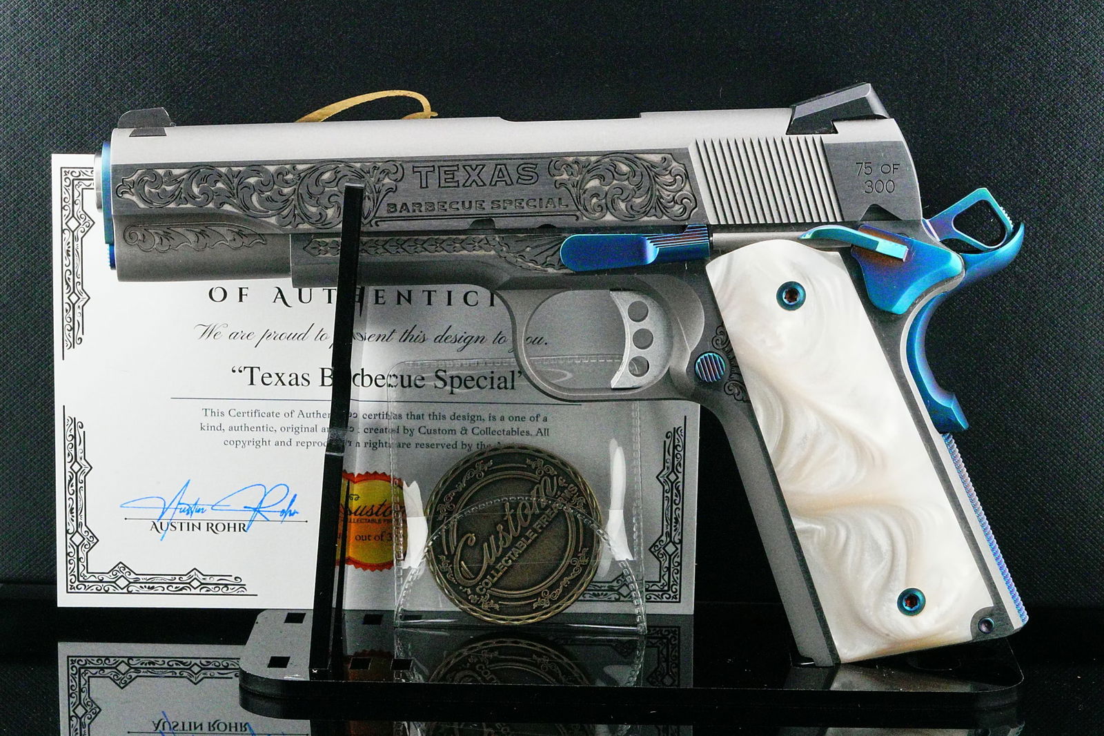 CNC Springfield 1911 "Texas BBQ" LD 75/300: The CNC CNCTXBBQ SPG 1911 .45 ACP Texas BBQ Limited Edition is a striking collector's pistol that blends classic 1911 performance with bold custom styling. Produced as a Sports South Exclusive, the