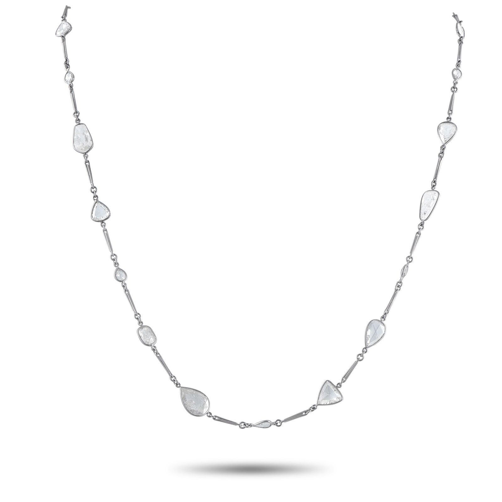 19.60ctw Diamond and Platinum 23" Necklace: 19.60ctw VS1-SI1/G-H Diamond and Platinum 23" Necklace - THIS ITEM WILL COME WITH A $27,000 INSURANCE VALUATION REPORT IN THE WINNING BIDDER'S NAME. This striking necklace showcases an elegant and int