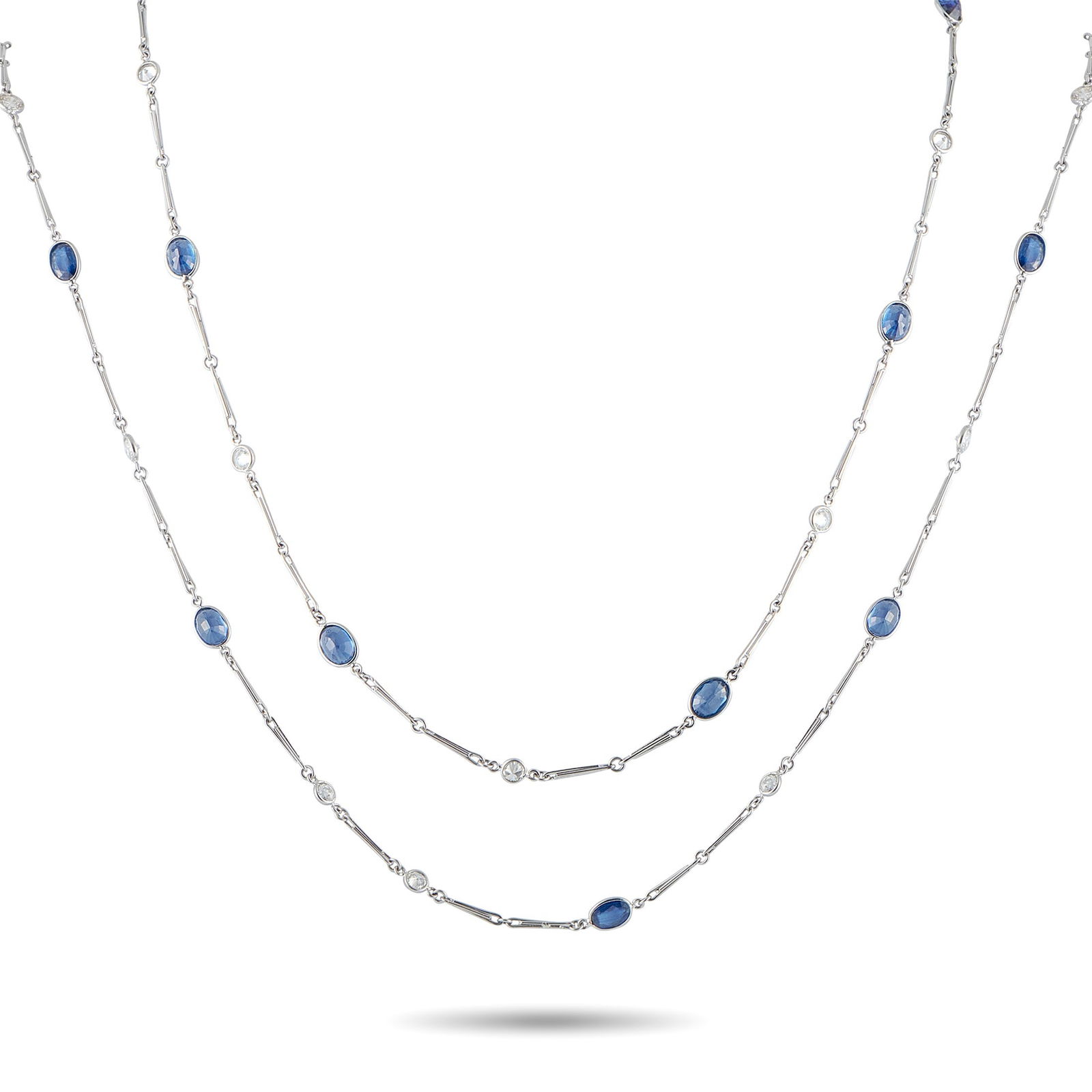 16.70ctw Sapphire, 3.50ctw Diamond, Platinum Necklace: 16.70ctw Blue Sapphire, 3.50ctw VS1-SI1/G-H Diamond and Platinum 46" Sautoir Necklace - THIS ITEM WILL COME WITH A $29,000 INSURANCE VALUATION REPORT IN THE WINNING BIDDER'S NAME. This elegant sautoir