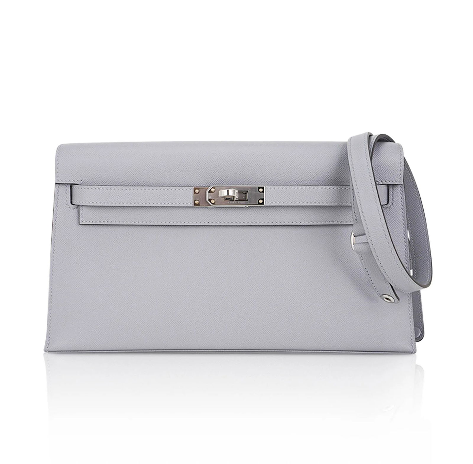 Hermes Gris Pantin Veau Madame Leather Kelly Elan: Hermes Gris Pantin Veau Madame Leather Kelly Elan W/Palladium Hardware (Includes Box and Sleeper) - The Hermes Kelly Elan in Gris Pantin embodies timeless sophistication through its sleek silhouette a
