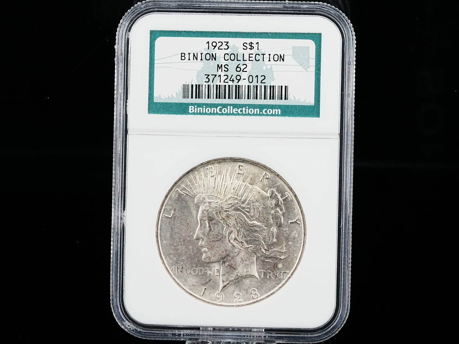 Binion Silver Hoard 1923 Silver Peace Dollar MS62 NGC: Authentic Binion Silver Hoard 1923 Silver Peace Dollar MS62 in NGC Slab - A highly collectible 1923 Silver Peace Dollar from the legendary Binion Silver Hoard, certified Mint State 62 by NGC (Numismat