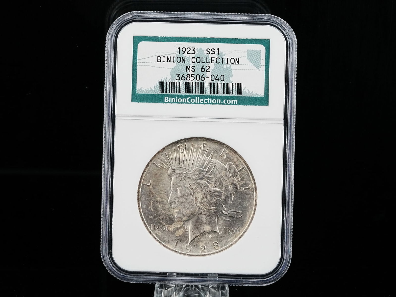 Binion Silver Hoard 1923 Silver Peace Dollar MS62 NGC: Authentic Binion Silver Hoard 1923 Silver Peace Dollar MS62 in NGC Slab - A highly collectible 1923 Silver Peace Dollar from the legendary Binion Silver Hoard, certified Mint State 62 by NGC (Numismat