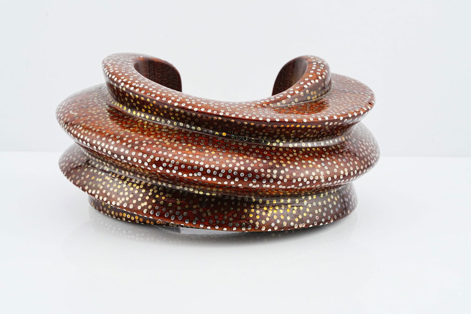 Patricia Von Musulin Rosewood and Sterling Bracelet: Patricia Von Musulin Rosewood and Sterling Silver Inlaid Nail Bracelet - This striking bracelet by Patricia Von Musulin showcases the designer's signature fusion of natural materials and refined metal