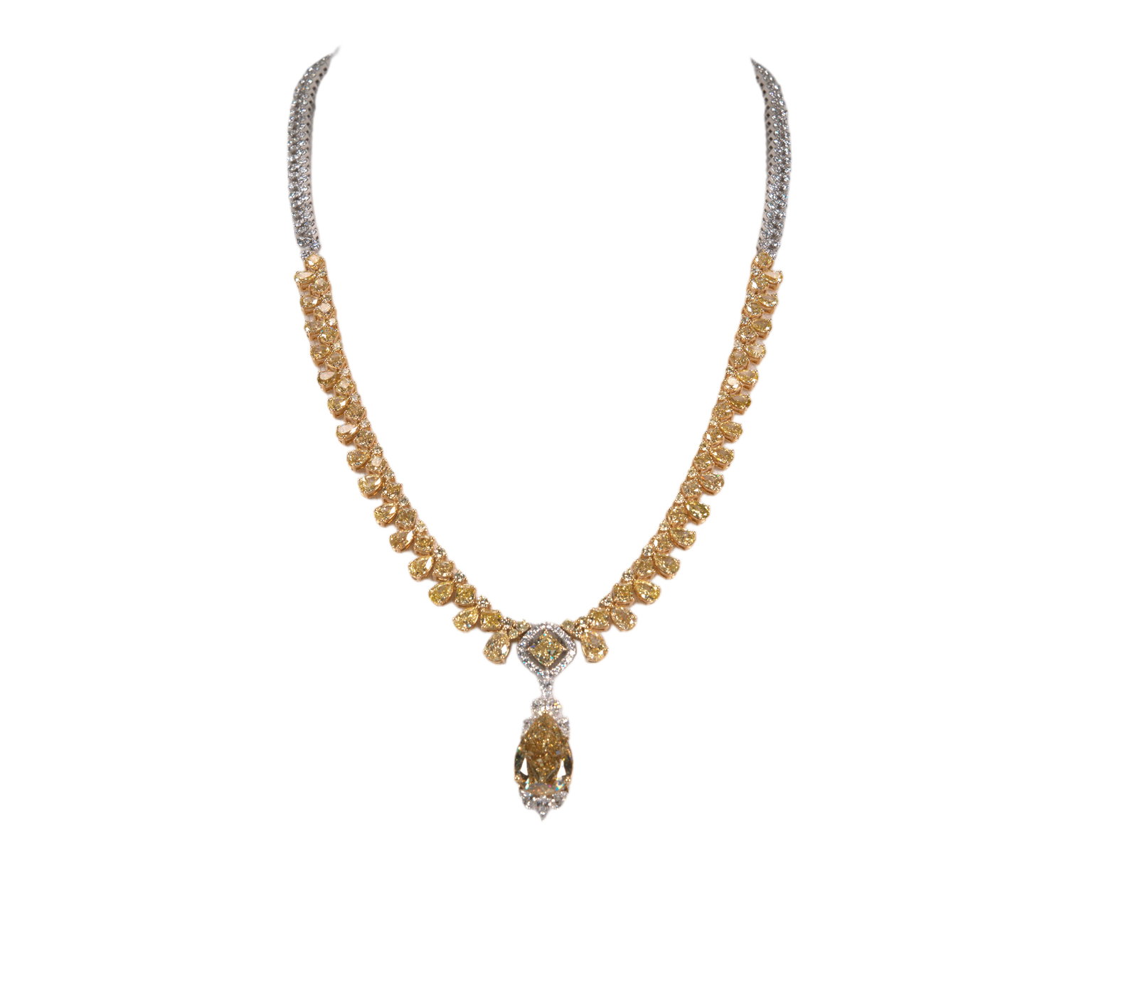 23.32ctw Yellow and White Diamond 18K Necklace: 23.32ctw Yellow and White Diamond 18K Yellow/White Gold 18" Cocktail Necklace - THIS ITEM WILL COME WITH A $545,000 INSURANCE VALUATION REPORT. Radiant and undeniably glamorous, this extraordinary dia