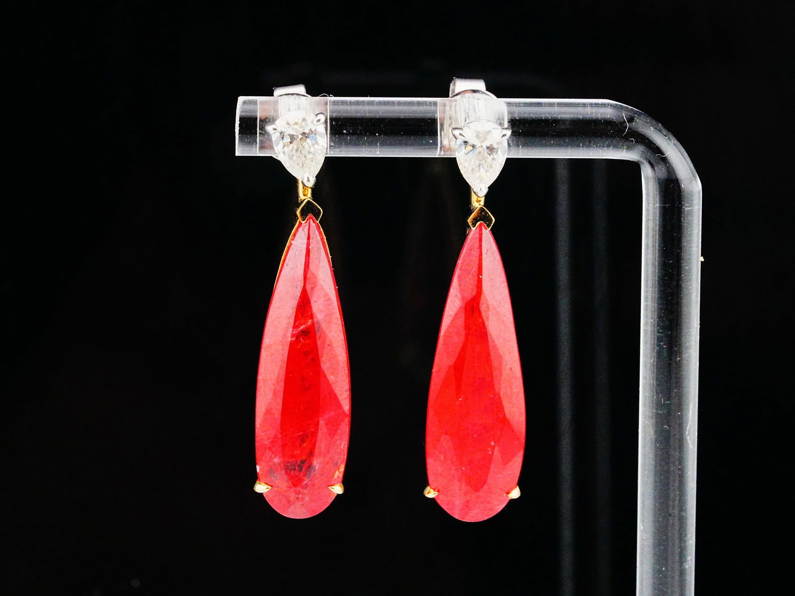 19.10ctw Rhodonite, 1.00ctw Diamond and 14K Earrings: 19.10ctw Rhodonite, 1.00ctw VS1-SI1/G-H Diamond and 14K Yellow/White Gold Drop Earrings - THIS ITEM WILL COME WITH A $32,500 INSURANCE VALUATION REPORT. A bold and elegant pair of statement earrings,
