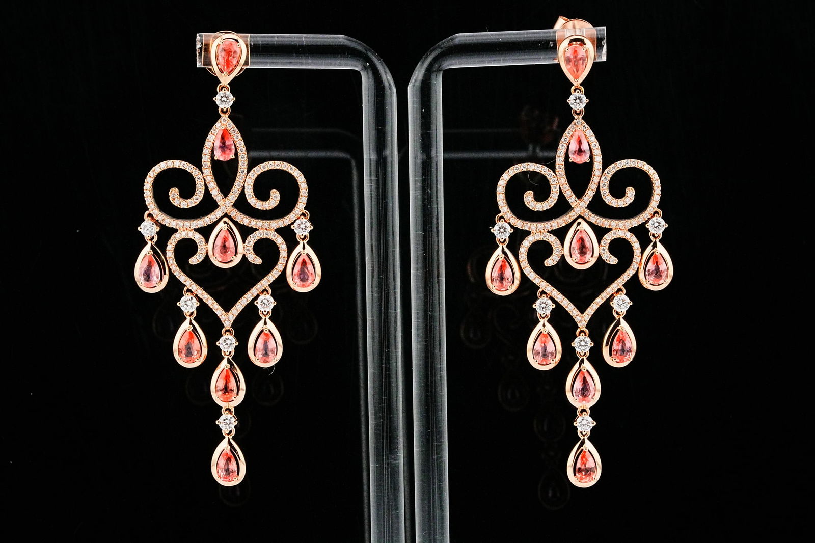 4.75ctw Padparadscha Sapphire and 1.75ctw Diamond Earrings: 4.75ctw Padparadscha Sapphire, 1.75ctw VS2-SI1/G-H Diamond and 18K Rose Gold 2.5" Chandelier Earrings - THIS ITEM WILL COME WITH A $16,000 INSURANCE VALUATION REPORT. An exquisite and romantic display