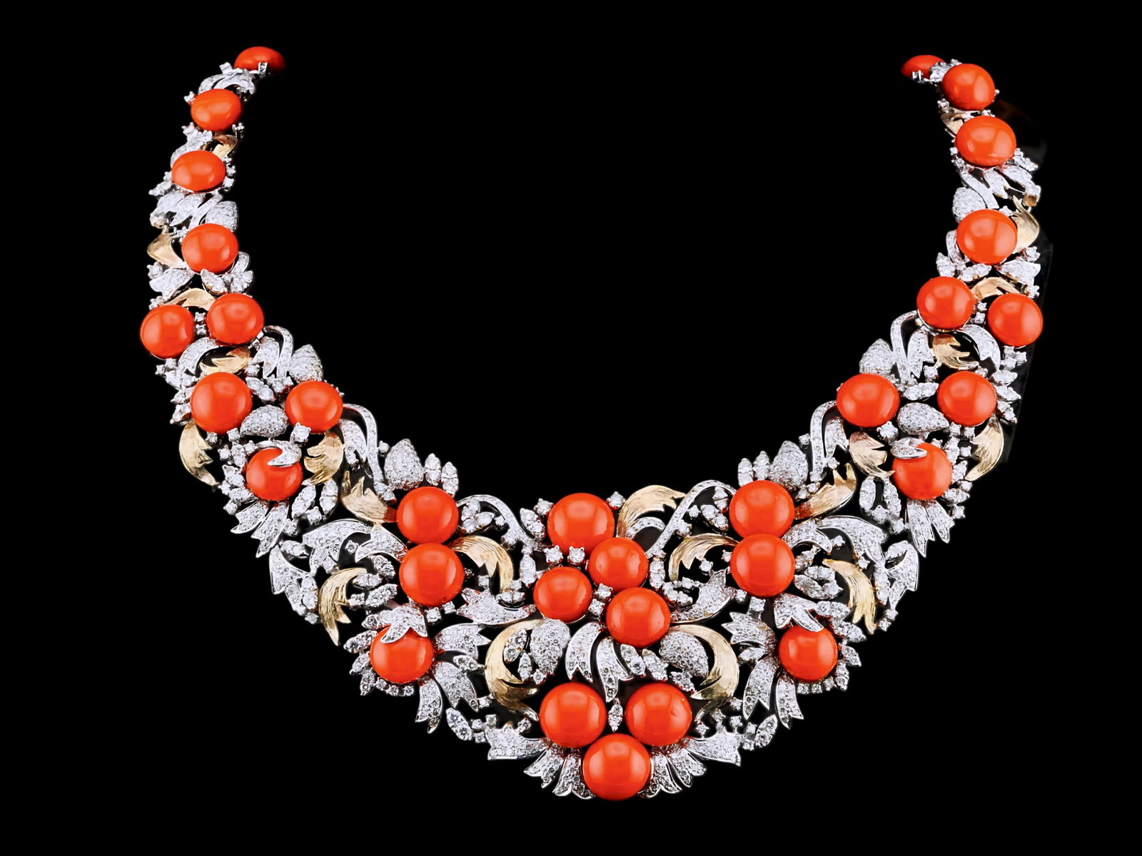 110.60ctw Red Coral, 18.00ctw Diamond and 18K Necklace: 110.60ctw Red Coral, 18.00ctw VS1-SI1/G-H Diamond and 18K White/Yellow Gold 16" Cocktail Necklace - THIS ITEM WILL COME WITH A $179,000 INSURANCE VALUATION REPORT. This magnificent cocktail necklace i