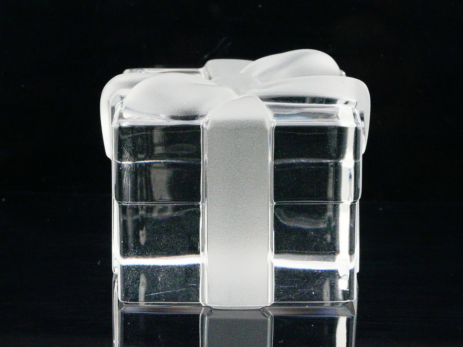 Tiffany & Co. Crystal Frosted Bow Gift Box Paperweight: Tiffany & Co. Crystal Frosted Bow Gift Box Paperweight - An elegant and iconic Tiffany & Co. crystal paperweight modeled as a neatly wrapped gift box topped with a frosted bow. Expertly crafted in