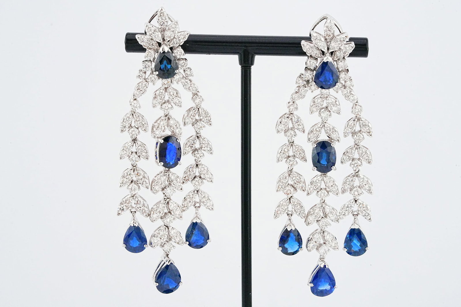 11.60ctw Blue Sapphire, 6.65ctw Diamond, 18K Earrings: 11.60ctw Blue Sapphire, 6.65ctw VS1-VS2/G-H Diamond and 18K White Gold 2.75" Chandelier Earrings - This item will come with a $53,000 insurance valuation report. Featuring approximately 11.60 carats