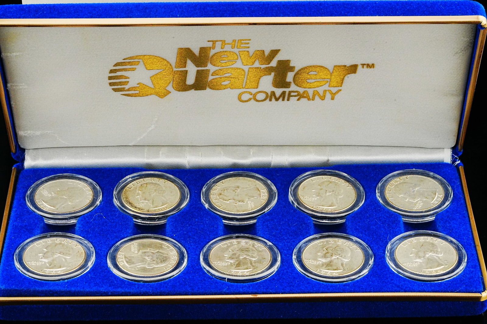 Binion Silver Hoard 1964-D Silver Quarters 10-Coin Set: Authentic Binion Silver Hoard "1964 Silver Sampler" Washington Silver Quarters 10-Coin Set W/Original Box and COA - An exceptional and highly collectible presentation, this 10-coin silver quarter set