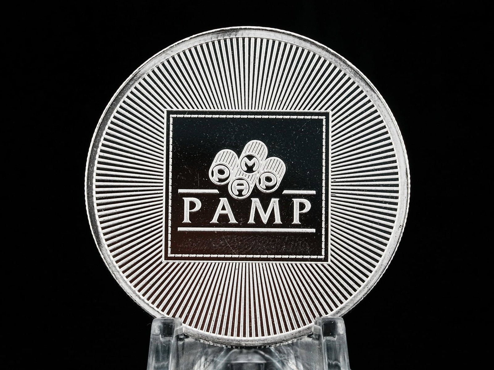PAMP USA 1 Troy Ounce .999 Fine Silver Bullion Round: PAMP USA 1 Troy Ounce .999 Fine Silver Bullion Round - Enhance your silver holdings with this exceptional 1 oz .999 fine silver round from PAMP, a globally respected name in precious metals. Combining