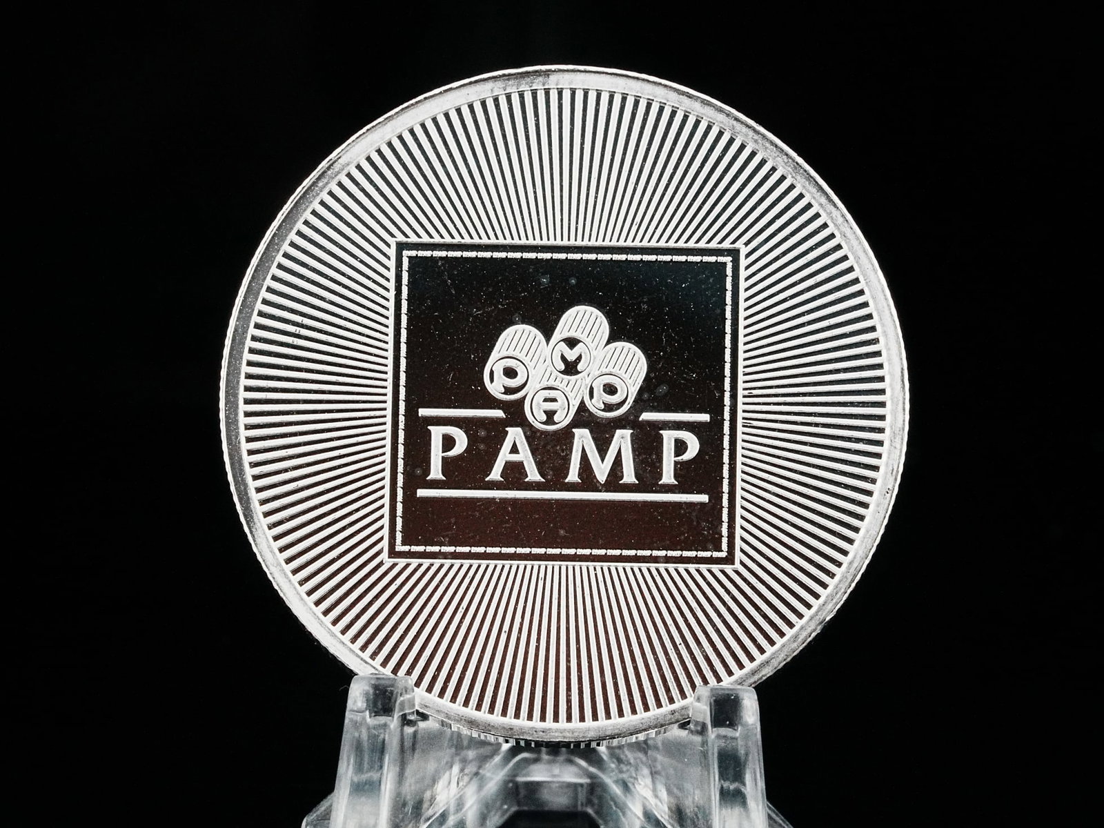 PAMP USA 1 Troy Ounce .999 Fine Silver Bullion Round: PAMP USA 1 Troy Ounce .999 Fine Silver Bullion Round - Enhance your silver holdings with this exceptional 1 oz .999 fine silver round from PAMP, a globally respected name in precious metals. Combining