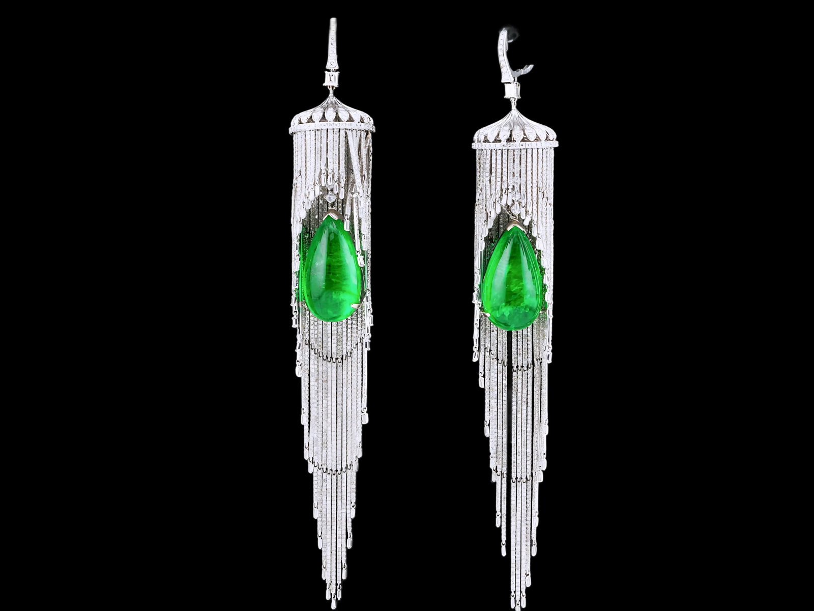 Cardi B Worn 52.86ctw Emerald, 18.50ctw Diamond Earrings: 52.86ctw Emerald, 18.50ctw VS1-SI1/G-H Diamond and 18K White Gold 5.75" Chandelier Earrings Worn by Cardi B on Album Cover - THIS ITEM WILL COME WITH A $289,000 INSURANCE VALUATION REPORT. An exceptio