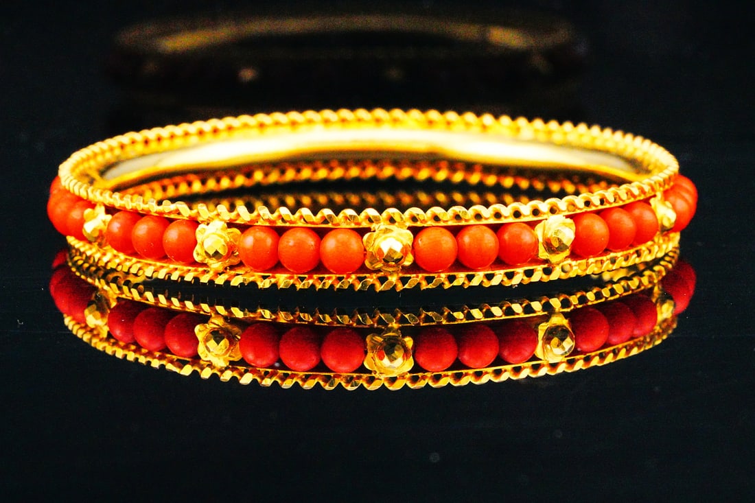 Solid 18K Yellow Gold and 5mm Red Coral Bead Bangle: Solid 18K Yellow Gold and 5mm Red Coral Bead Bangle - A vibrant celebration of color, craftsmanship, and timeless elegance, this Solid 18K Yellow Gold and Red Coral Bead Bangle captures the enduring a