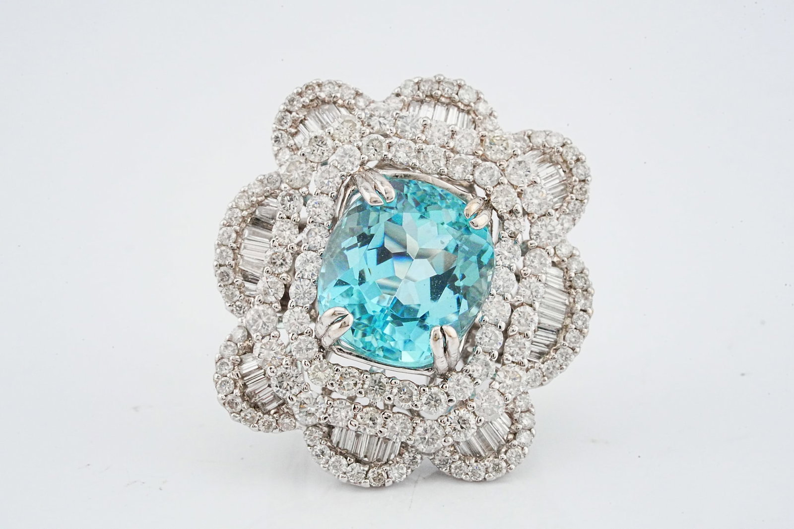 8.00ct Aquamarine, 4.75ctw Diamond and 18K Ring: 8.00ct Aquamarine, 4.75ctw VS1-SI1/G-H Diamond and 18K White Gold Ring - THIS ITEM WILL COME WITH A $23,000 INSURANCE VALUATION REPORT. An extraordinary statement ring showcasing an approximately 8.00