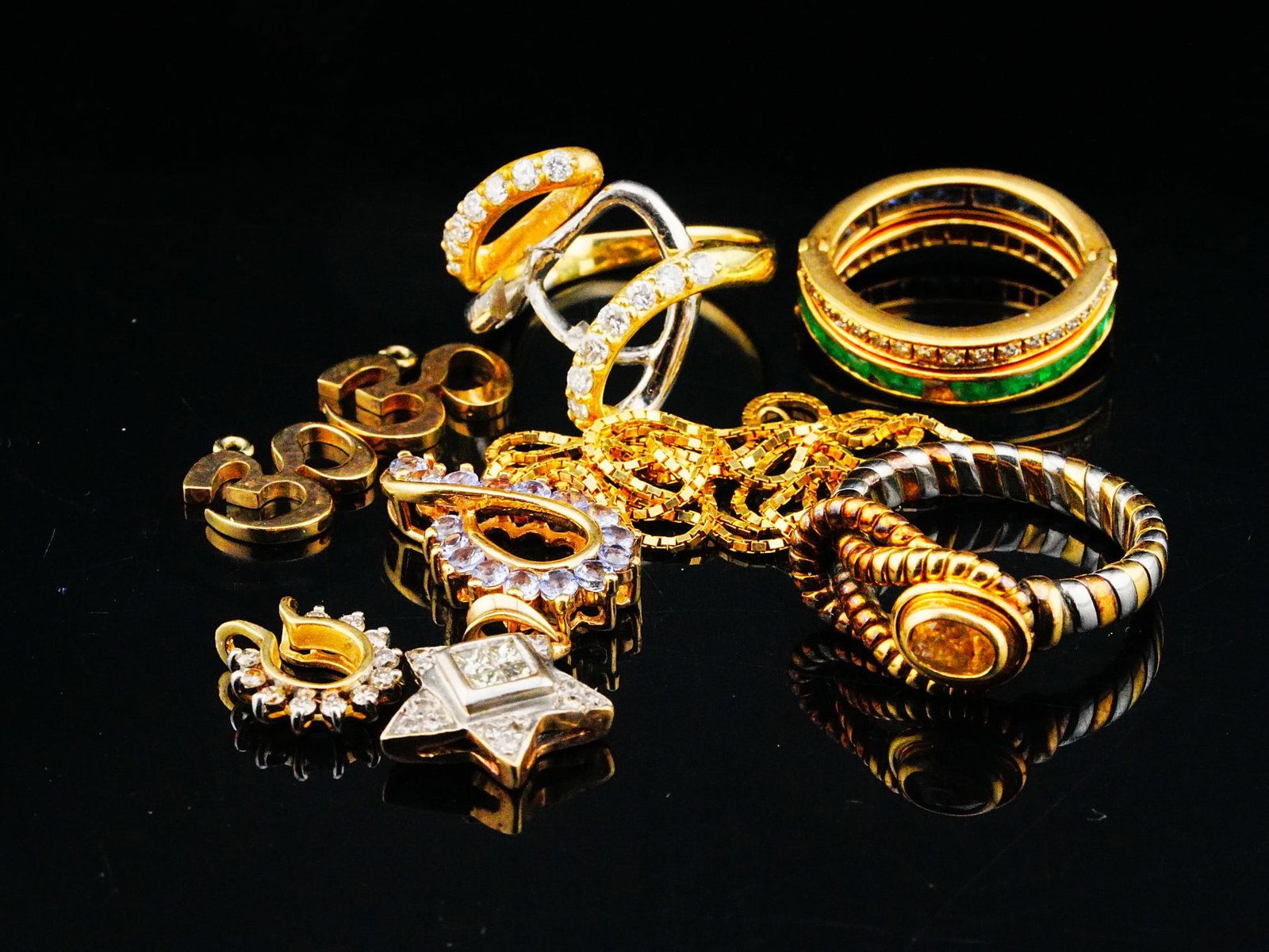 Mixed Lot of 27.3 Grams 18K/14K Gold Some W/Diamonds: Mixed Lot of 27.3 Grams Scrap 14K/18K Gold W/Gemstones and Diamonds - Mixed lot of scrap gold jewelry weighing 27.3 grams total, consisting of approximately 9 grams of 14K gold and 18.3 grams of 18K