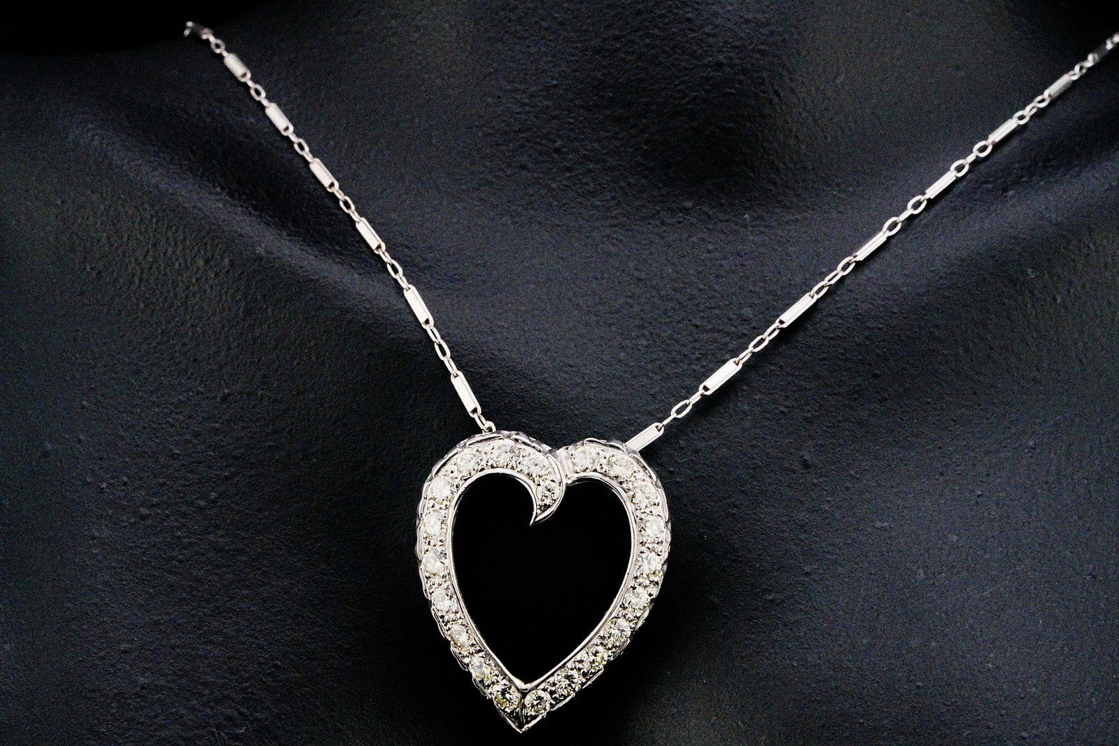 1.00ctw Diamond and 14K 23" Heart Pendant Necklace: 1.00ctw SI1-SI2/G-H Diamond and 14K White Gold 23" Heart Pendant Necklace - Elegant and timeless, this romantic heart pendant necklace showcases approximately 1.00 carat total weight of sparkling diam