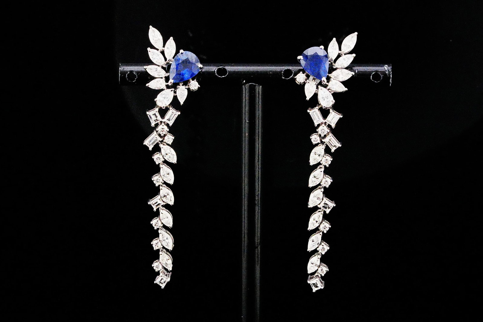 4.00ctw Diamond, 2.50ctw Blue Sapphire and 18K Earrings: 4.00ctw VS1-VS2/G-H Diamond, 2.50ctw Blue Sapphire and 18K White Gold 2.30" Dangle Earrings - THIS ITEM WILL COME WITH A $25,000 INSURANCE VALUATION REPORT. A striking expression of elegance and excep