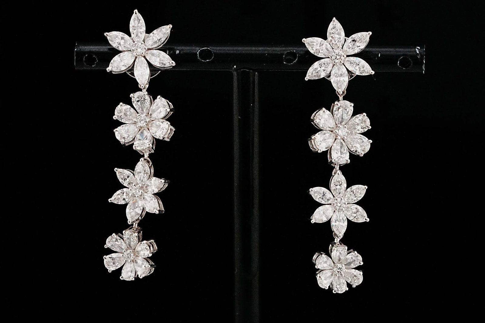 7.35ctw VS2-SI2/G-H Diamond and 18K 1.80" Earrings: 7.35ctw VS2-SI2/G-H Diamond and 18K White Gold 1.80" Floral Drop Earrings - THIS ITEM WILL COME WITH A $34,000 INSURANCE VALUATION REPORT. A radiant celebration of feminine elegance and exceptional cr