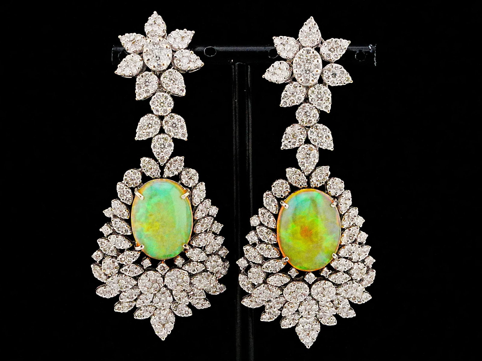 15.80ctw Opal, 12.50ctw Diamond and 18K 3.10" Earrings: 15.80ctw Opal, 12.50ctw VS1-SI1/G-H Diamond and 18K White Gold 3.10" Statement Earrings - THIS ITEM WILL COME WITH A $40,000 INSURANCE VALUATION REPORT. A breathtaking display of extraordinary scale a