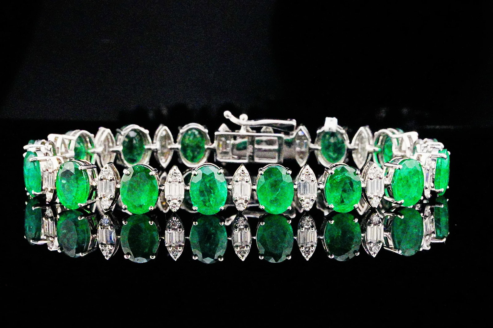 16.40ctw Emerald, 2.40ctw Diamond and 18K 7" Bracelet: 16.40ctw Emerald, 2.40ctw VS1-VS2/G-H Diamond and 18K White Gold 7" Bracelet - THIS ITEM WILL COME WITH A $41,000 INSURANCE VALUATION REPORT. A timeless and elegant gemstone bracelet, this exceptional